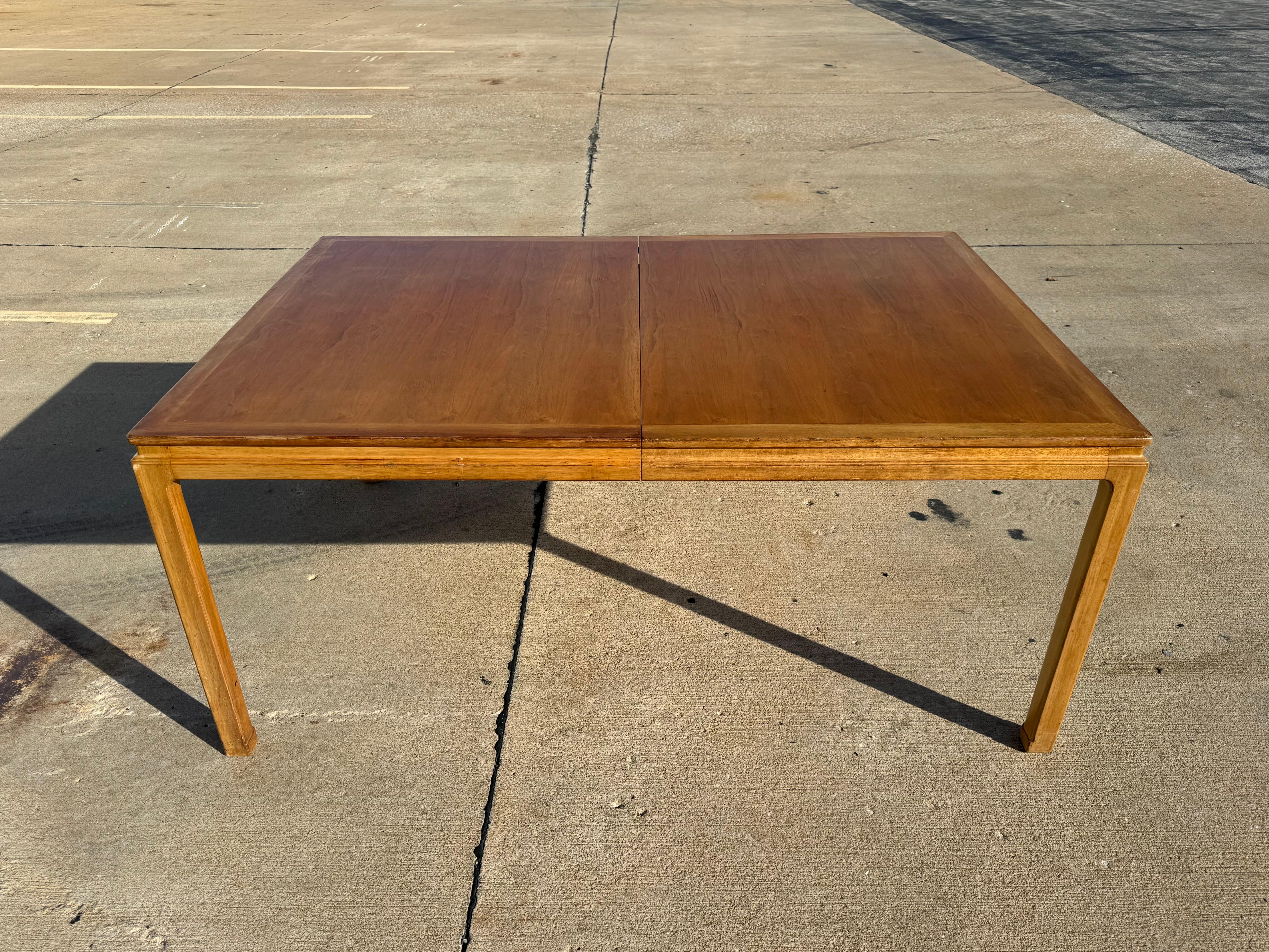 Edward Wormley - Dunbar for Modern large Asian influenced Mid-Century extension dining table, shown in original bleached mahogany frame with contrasting book matched walnut veneer top. This table has two 24