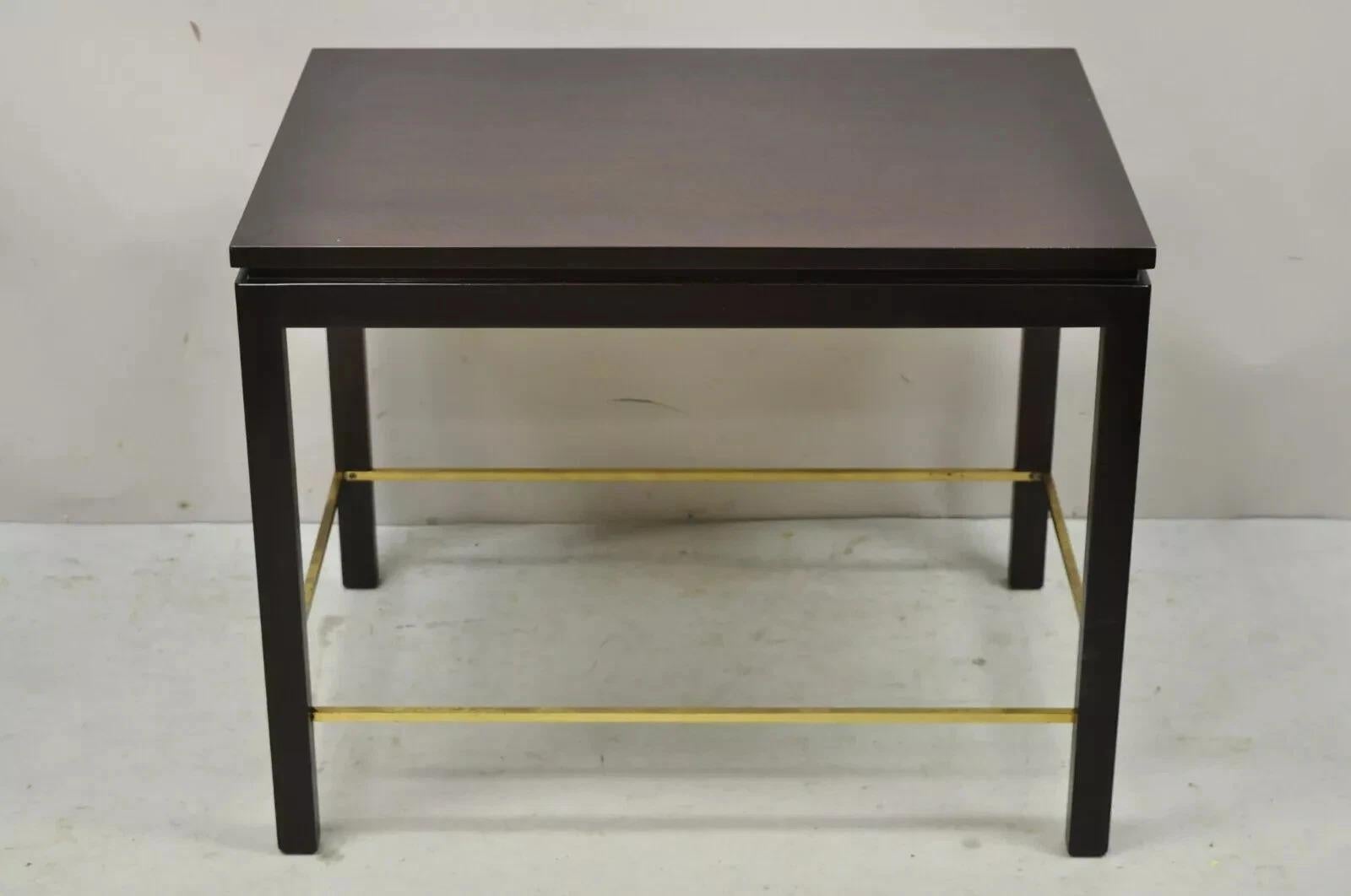 Vintage Edward Wormley for Dunbar Mahogany Mid Century Modern Brass Stretcher Side Table. Item features beautiful wood grain, brass accents, original label, and quality American craftsmanship. Circa Late 20th Century. Measurements: 22