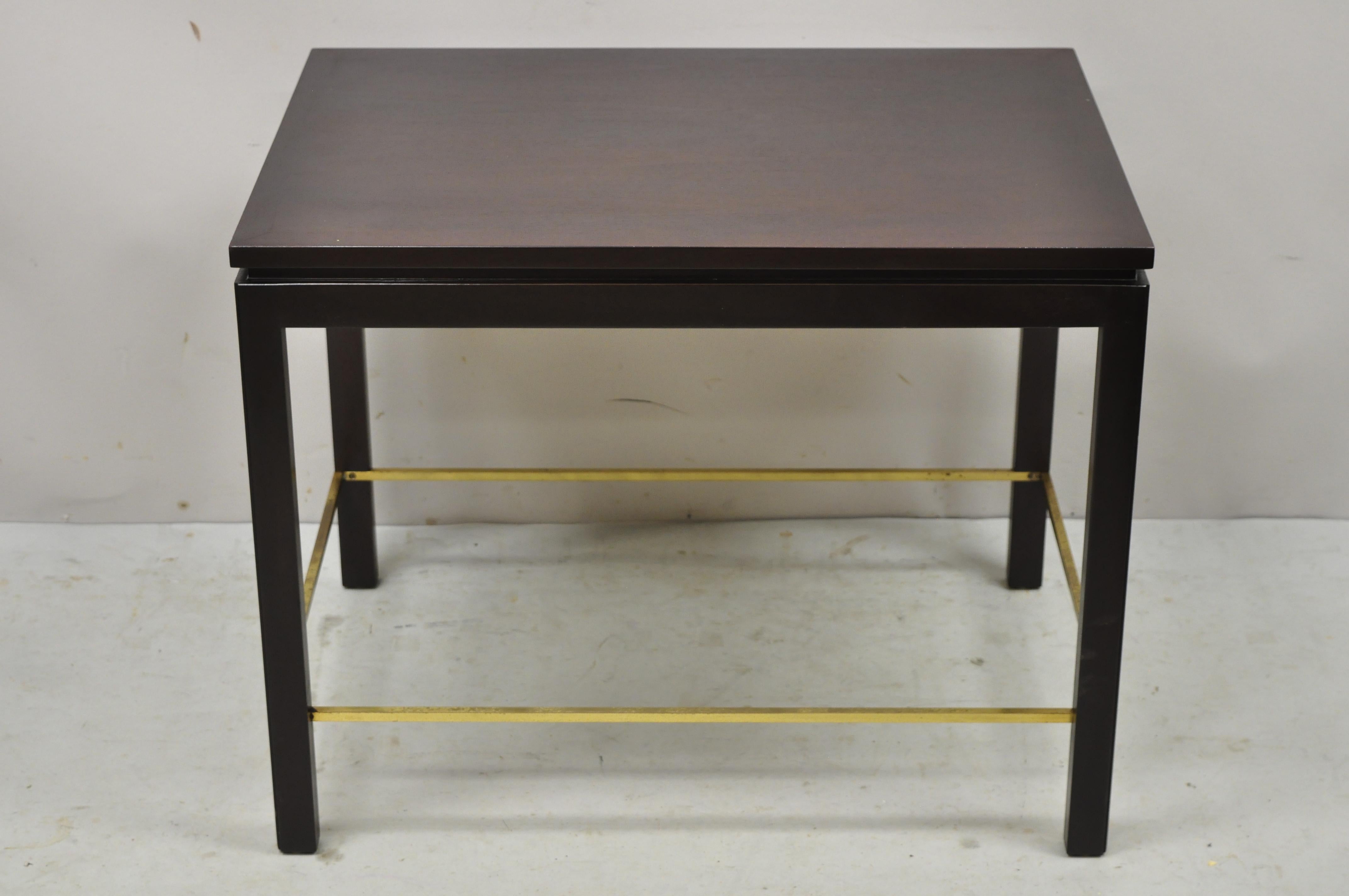 Edward Wormley for Dunbar mahogany side table brass stretcher Mid-Century Modern. Item features beautiful wood grain, brass accents, original label, very nice antique item, clean modernist lines, quality American craftsmanship. Circa 1976.