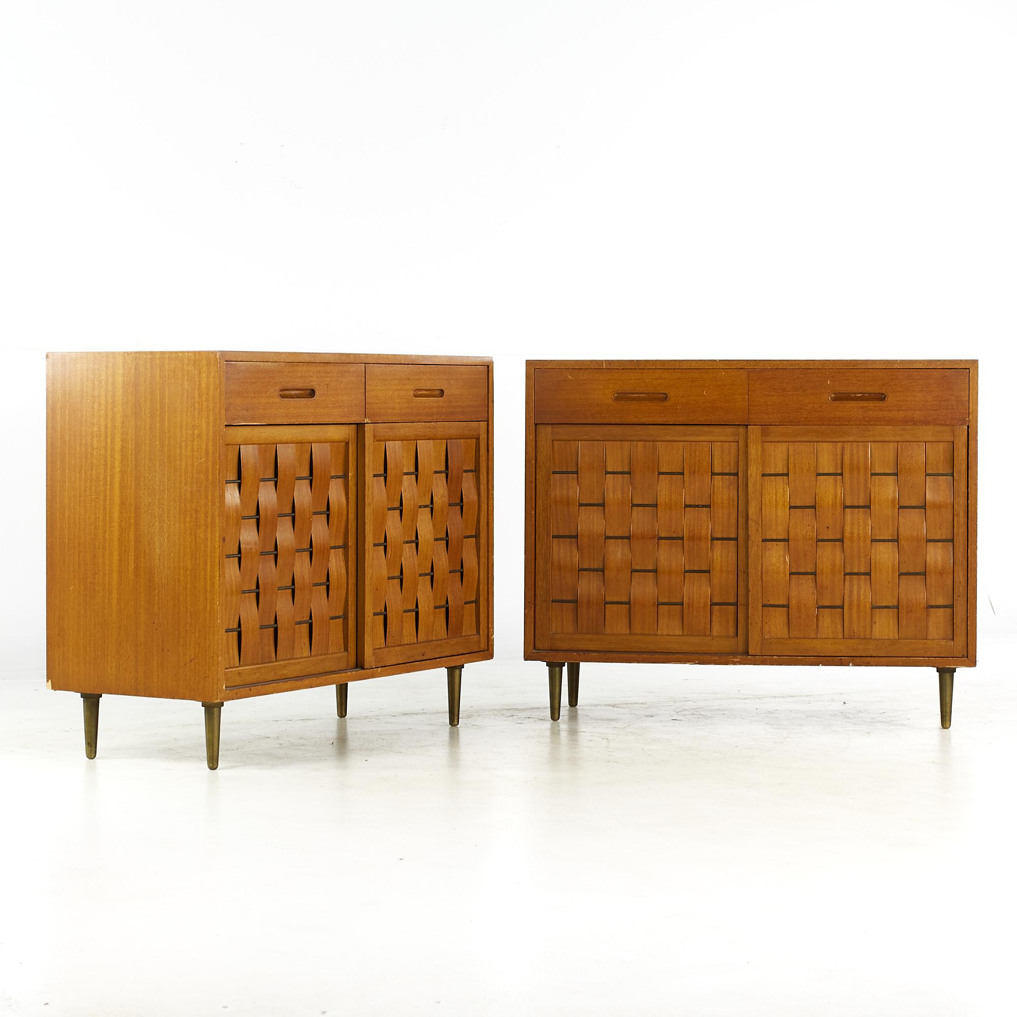 Edward Wormley for Dunbar mid-century bleached mahogany sliding door credenza - pair.

Each credenza measures: 41.5 wide x 18 deep x 34 inches high.

All pieces of furniture can be had in what we call restored vintage condition. That means the