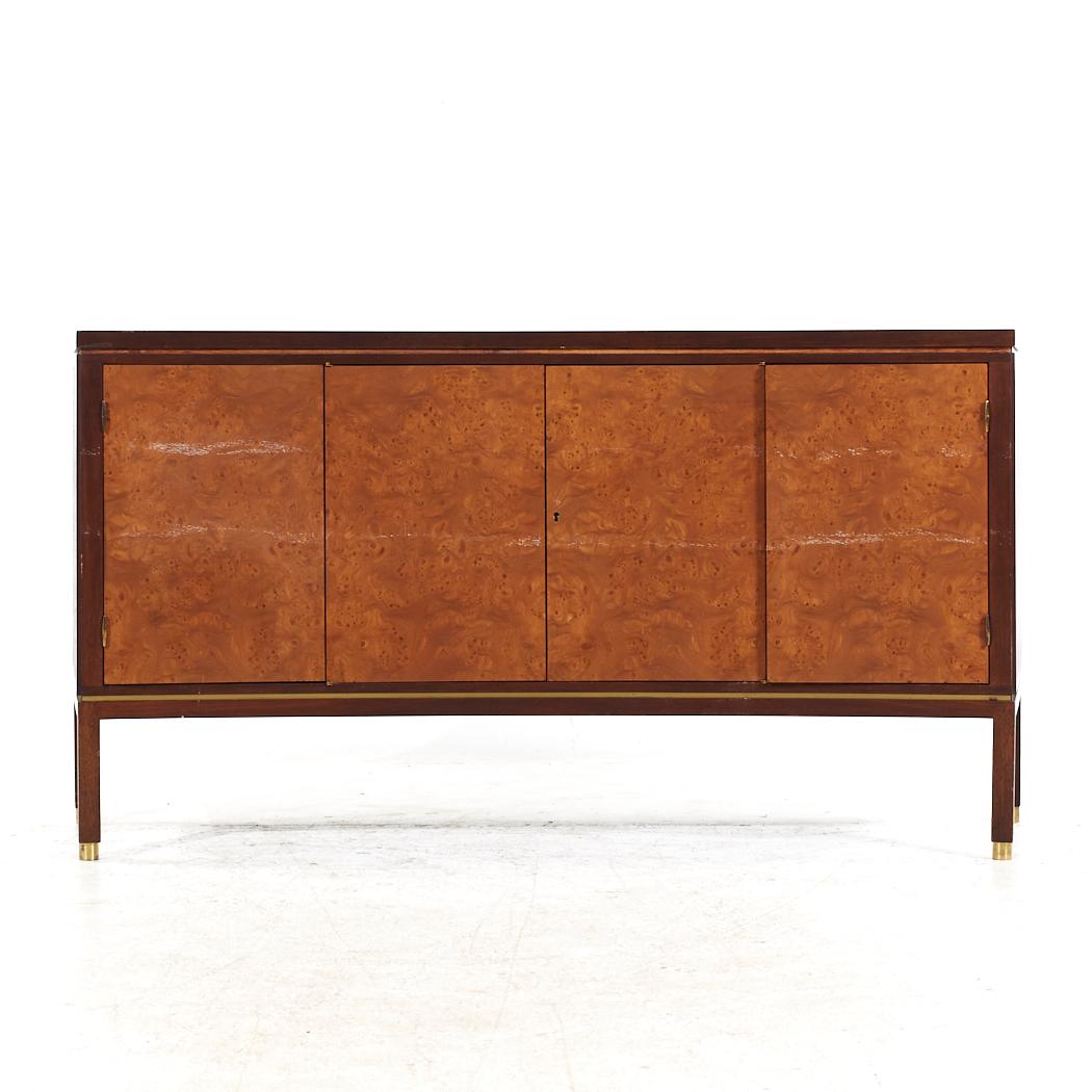 Edward Wormley for Dunbar Mid Century Curved Front Burlwood, Mahogany and Brass Credenza

This credenza measures: 65.5 wide x 19 deep x 33.25 inches high

All pieces of furniture can be had in what we call restored vintage condition. That means the