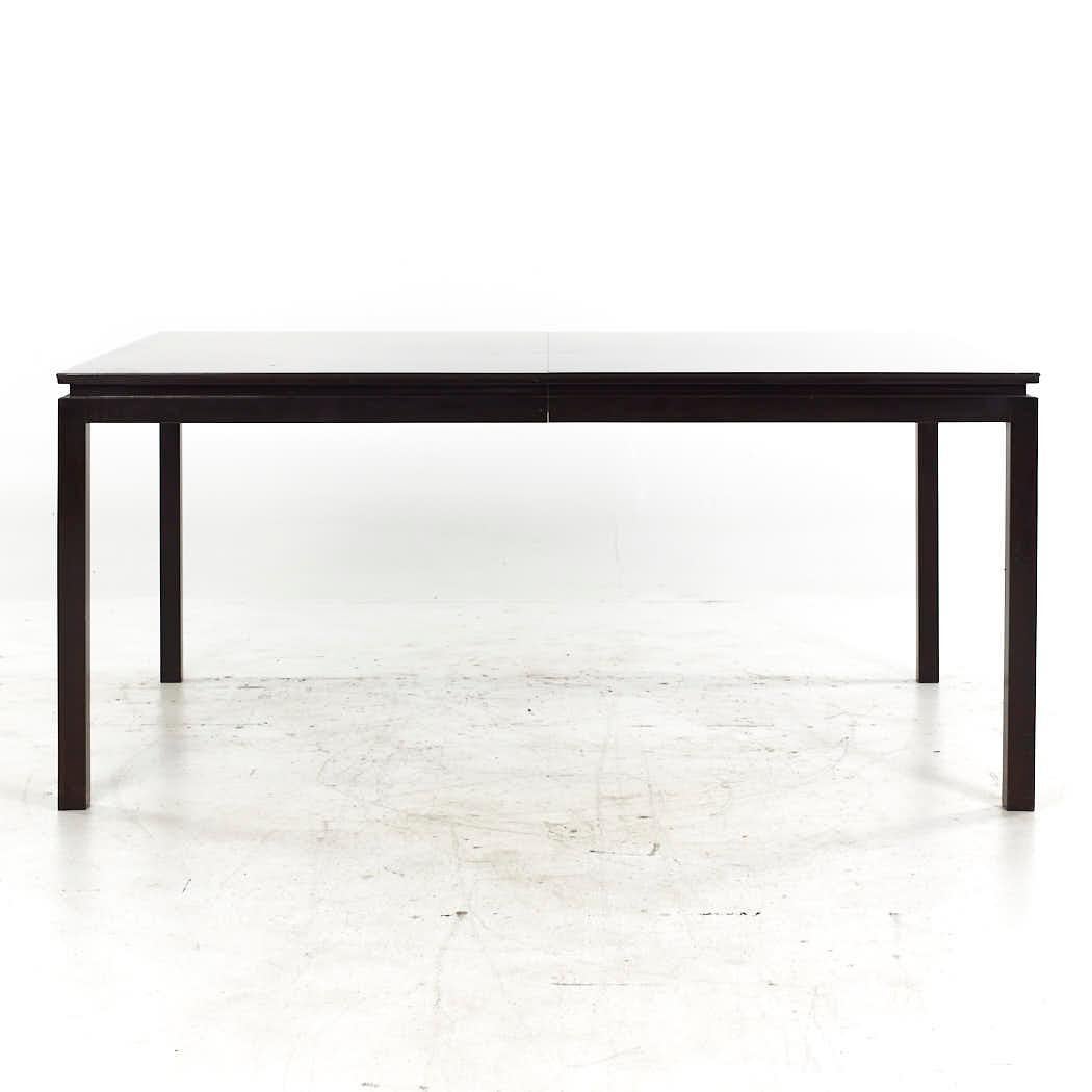 Edward Wormley for Dunbar Mid Century Rosewood and Ebonized Oak Expanding Dining Table with 2 Leaves

This table measures: 66 wide x 44.25 deep x 29.5 inches high, with a chair clearance of 26 inches, each leaf measures 24 inches wide, making a