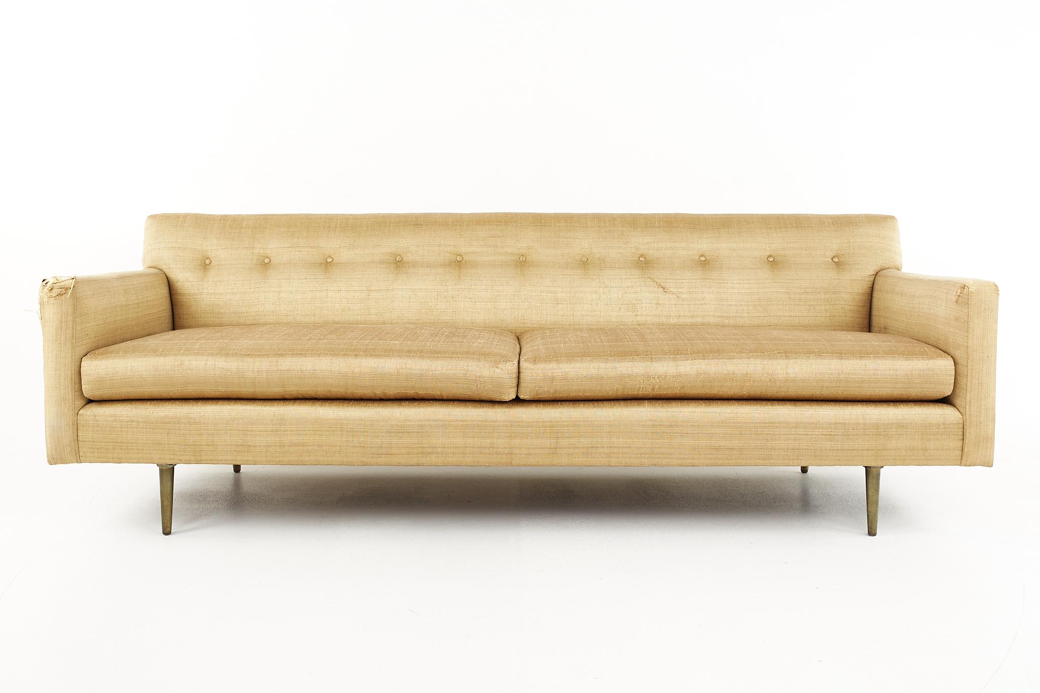 Edward Wormley for Dunbar mid century brass leg sofa

The sofa measures: 85 wide x 32 deep x 29 inches high, with a seat height of 17 and arm height of 23.5 inches

Ready for new upholstery. This service is available for an additional