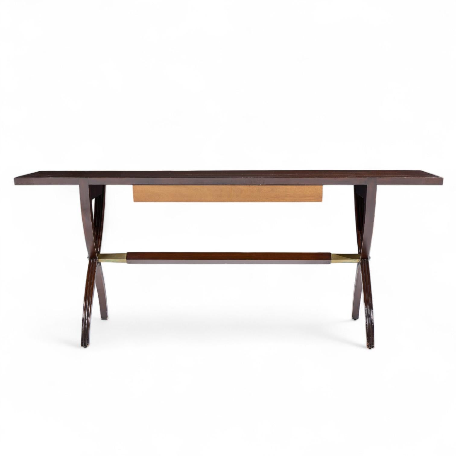 Edward Wormley for Dunbar Mid Century Brass, Walnut and Mahogany Console Table

This console table measures: 72 wide x 19 deep x 29.25 inches high

Good Vintage Condition - Table has Minor Finish Wear Throughout. Small Nick on Bottom of One of the