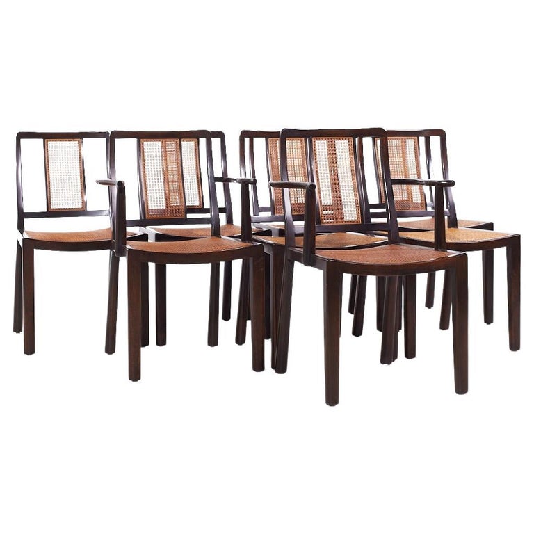 A Set of Eight Walnut and Caned Dining Chairs Designed by Edward Wormley. A Set of Eight Walnut and Caned Dining Chairs Designed by Edward Wormley.