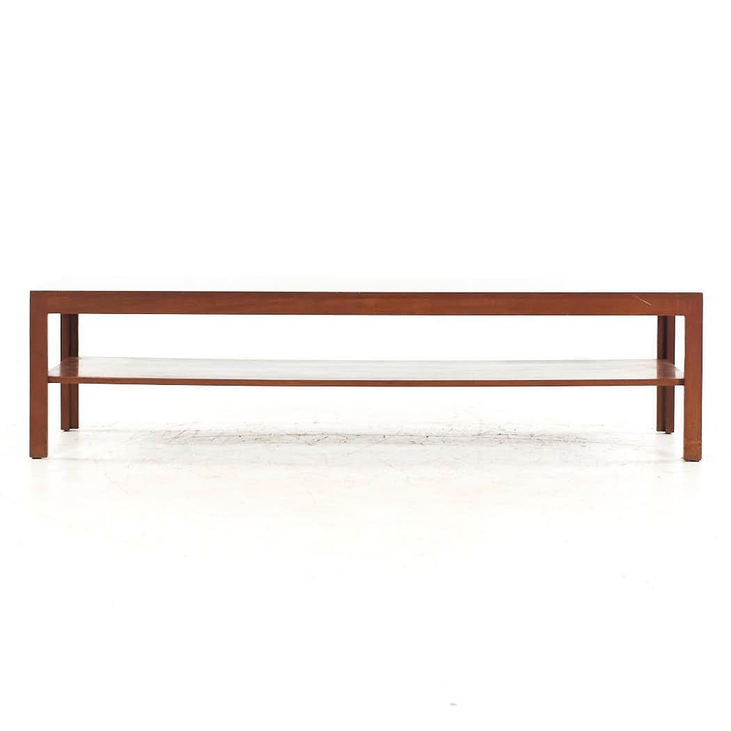 Edward Wormley for Dunbar Mid Century Coffee Table

This coffee table measures: 60 wide x 19 deep x 15.25 inches high

All pieces of furniture can be had in what we call restored vintage condition. That means the piece is restored upon purchase so