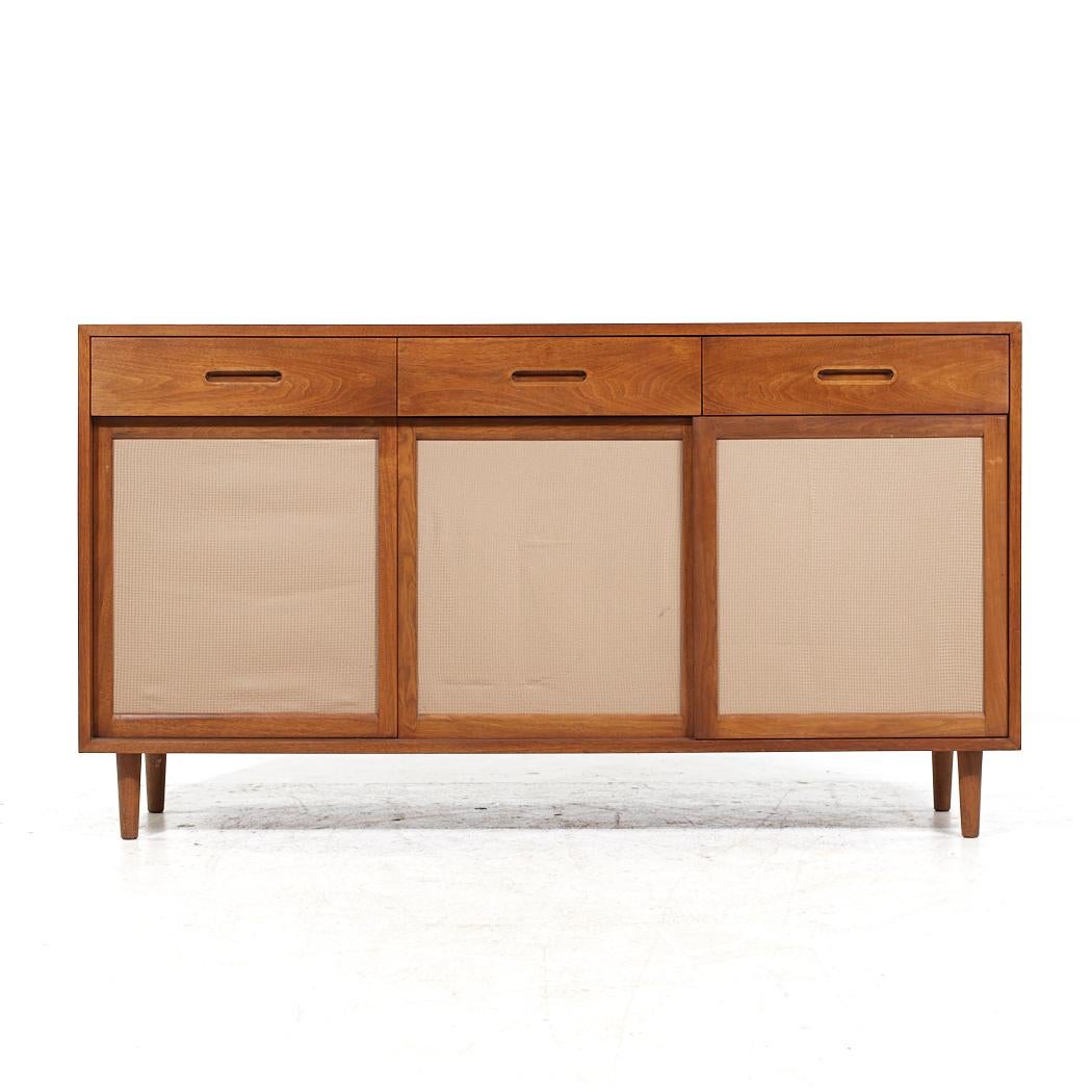 Edward Wormley for Dunbar Mid Century Mahogany Credenza

This credenza measures: 61.5 wide x 18 deep x 34 inches high

All pieces of furniture can be had in what we call restored vintage condition. That means the piece is restored upon purchase so