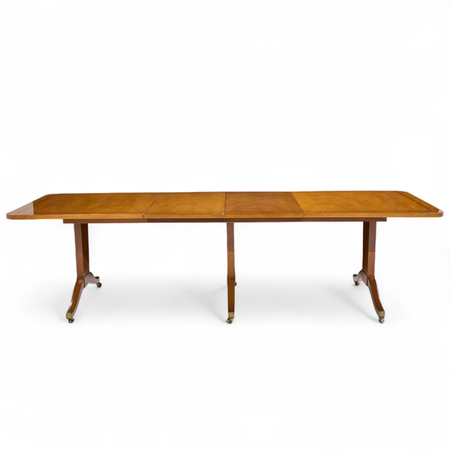 Edward Wormley for Dunbar Mid Century Mahogany Expanding Dining Table with 2 Leaves

This table measures: 70 wide x 42 deep x 29 inches high, with a chair clearance of 27.25 inches, each leaf measures 20 inches wide, making a maximum table width of