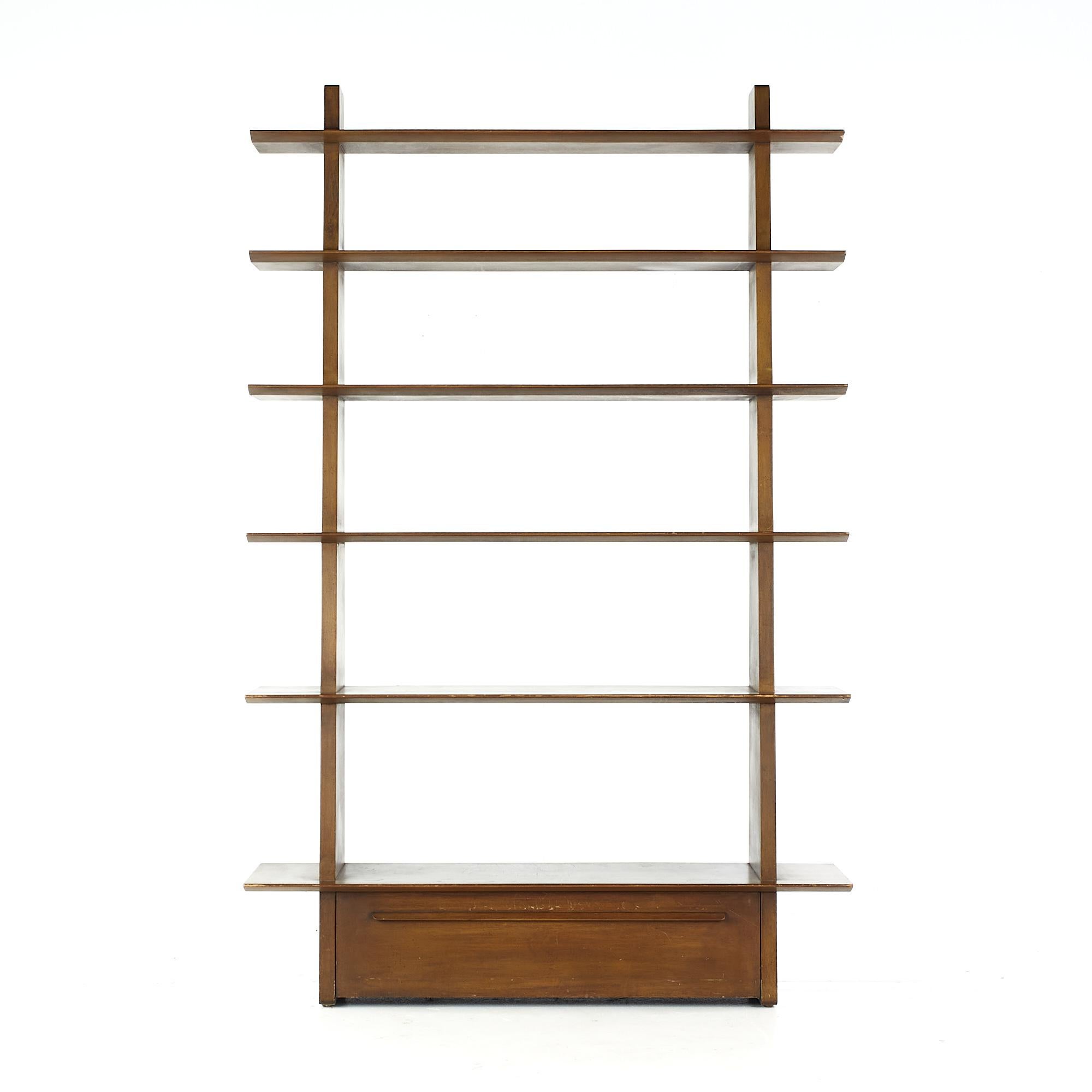Edward Wormley for Dunbar mid-century model 5264 shelf bookcase.

This bookcase measures: 48 wide x 14.25 deep x 74.25 inches high.

All pieces of furniture can be had in what we call restored vintage condition. That means the piece is restored