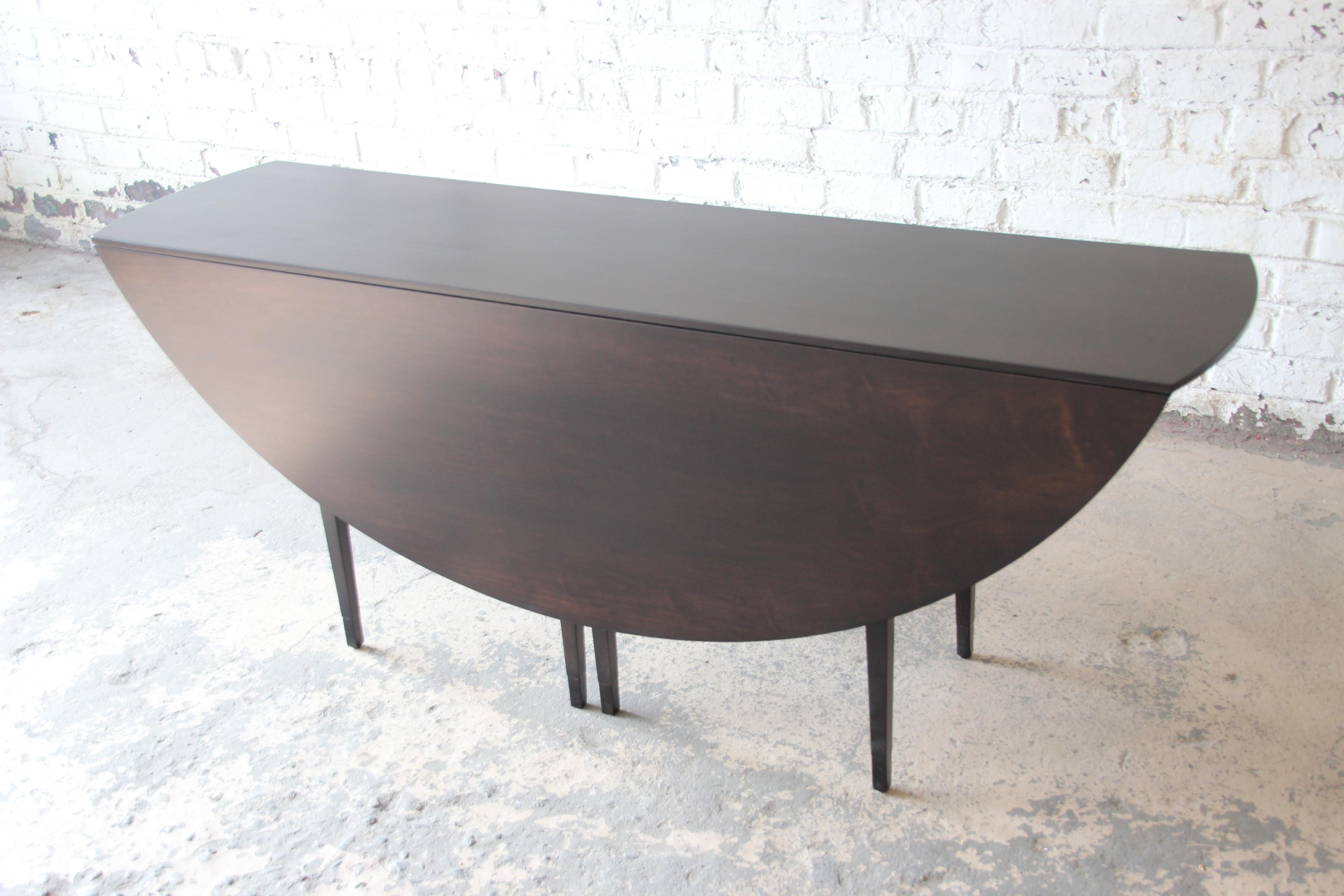 Leather Edward Wormley for Dunbar Mid-Century Modern Walnut Oval Drop-Leaf Dining Table