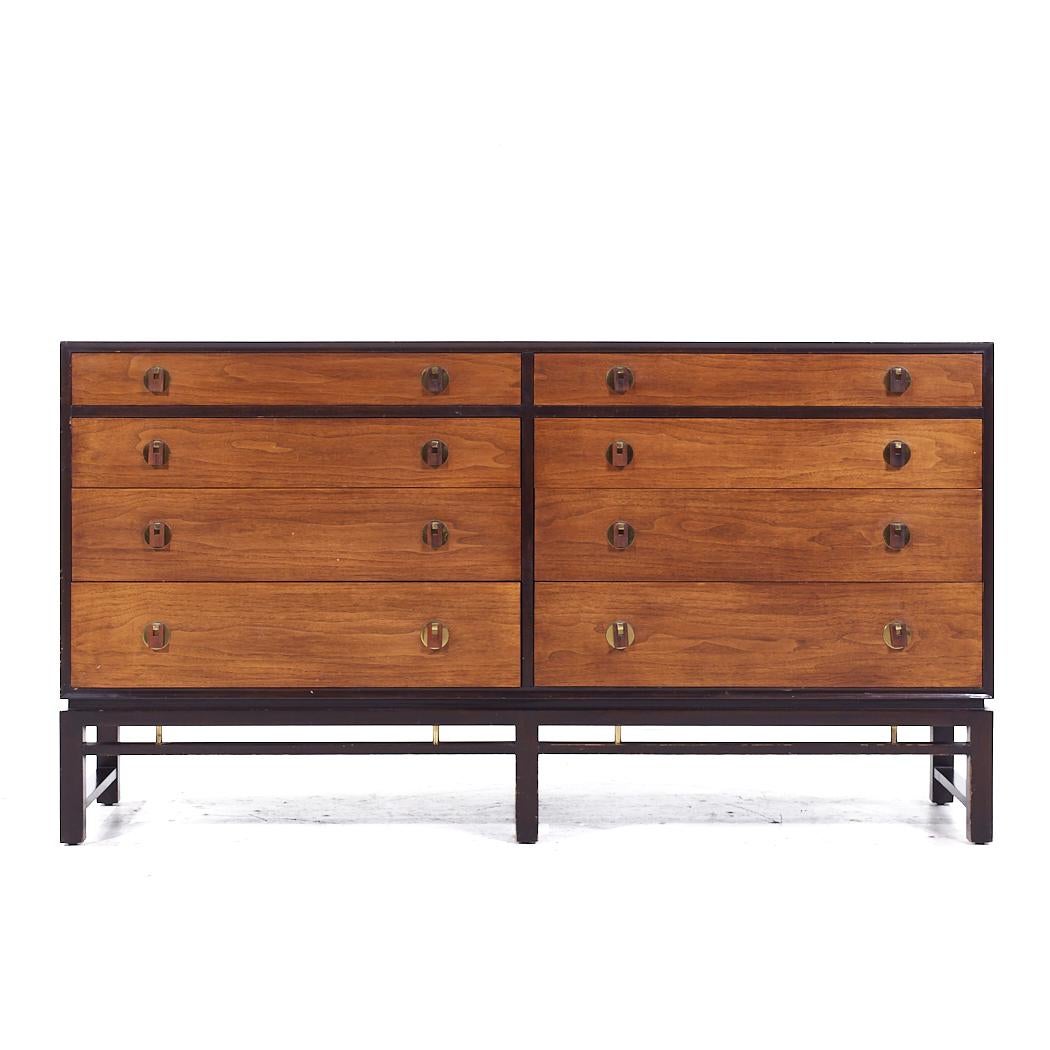 Edward Wormley for Dunbar Mid Century Rosewood and Walnut Lowboy Dresser

This lowboy measures: 65.25 wide x 18.25 deep x 36.25 inches high

All pieces of furniture can be had in what we call restored vintage condition. That means the piece is