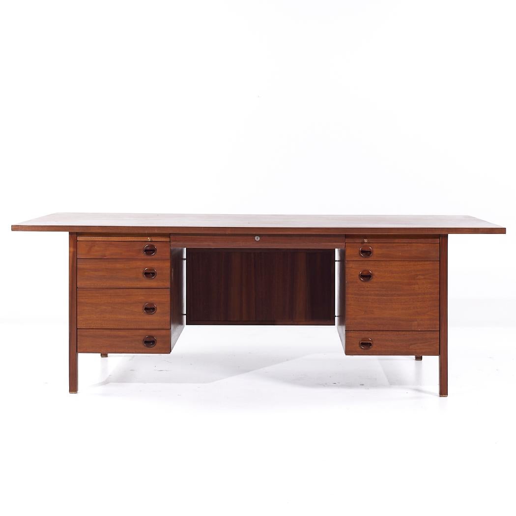 Edward Wormley for Dunbar Mid Century Walnut and Rosewood Executive Desk

This desk measures: 84 wide x 40 deep x 29 high, with a chair clearance of 25 inches

All pieces of furniture can be had in what we call restored vintage condition. That means