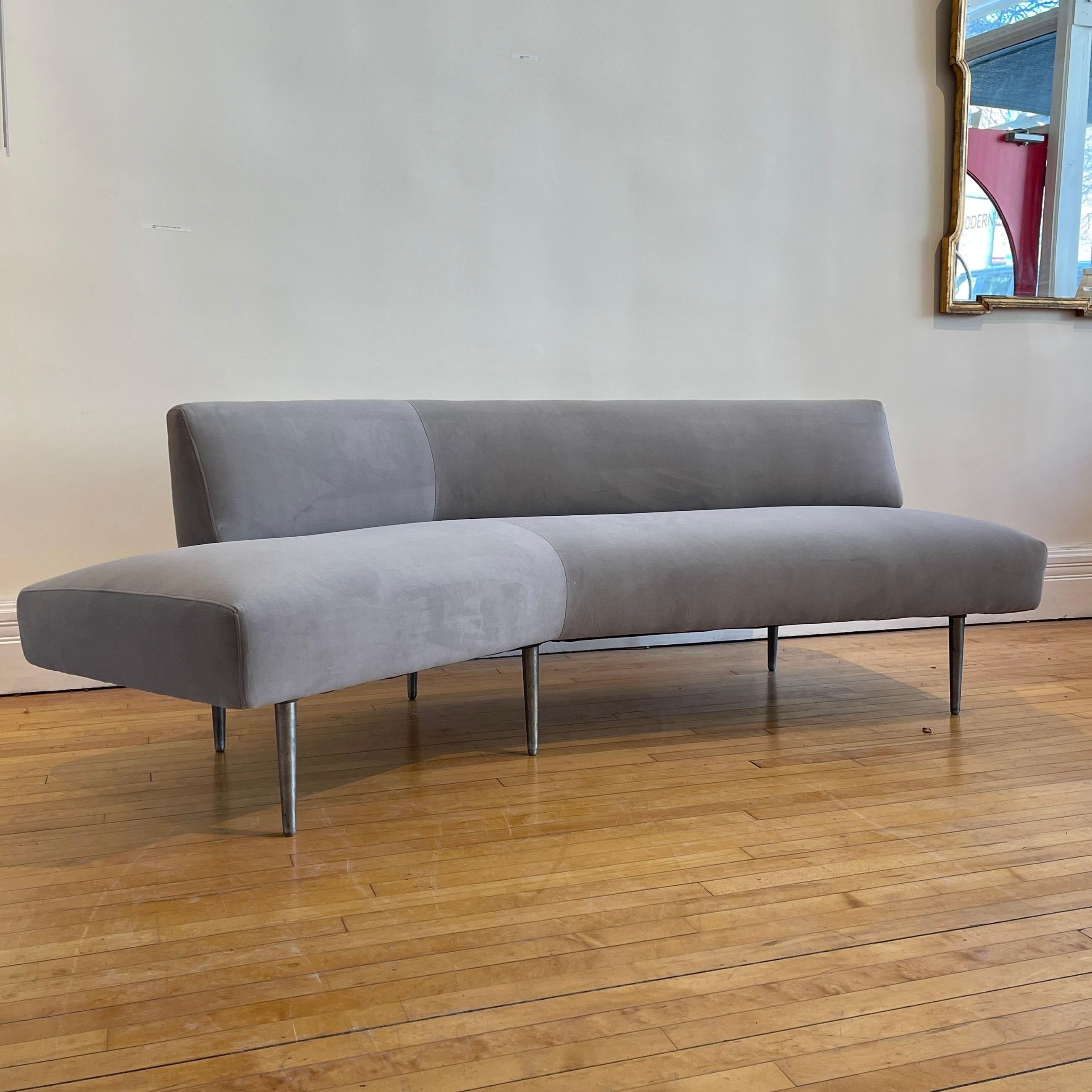 Model 4756 designed by Edward Wormley for Dunbar. Striking angular curved sofa. This piece is amongst Wormley's most collectable pieces. Freshly reupholsted in a stunning high grade grey velvet. Absolutely stunning.

 
