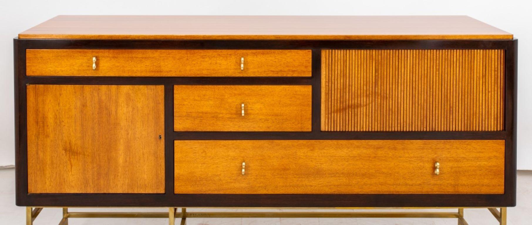 Edward Wormley for Dunbar Model 5465 Mahogany Sideboard, designed 1957, three drawers, tambour door, and one door opening to compartment with shelf, with bronze base, 