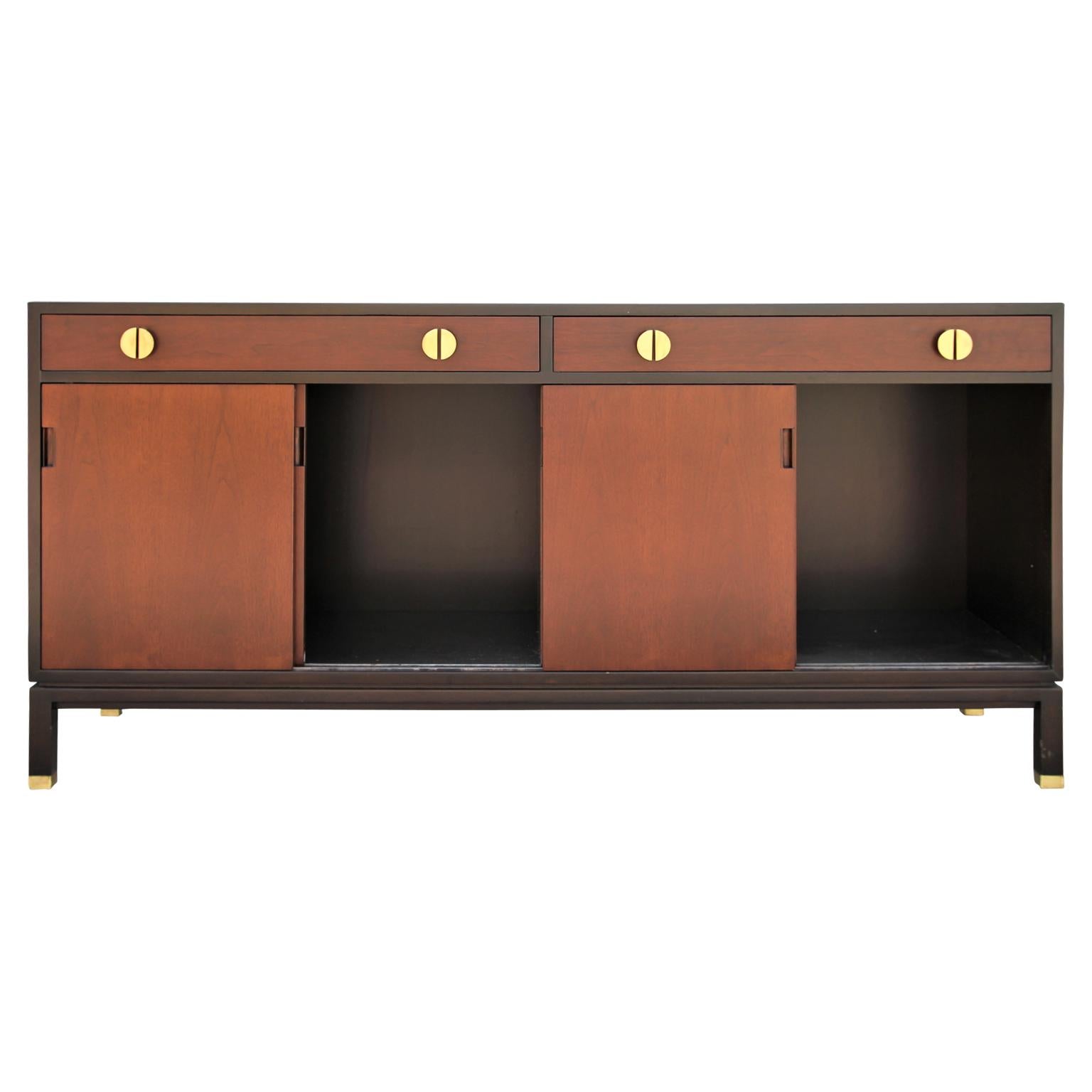 Great two-tone sideboard designed by Edward Wormley for Dunbar, circa 1960s. Restored within the last 5 years. Features for sliding doors and two drawers.