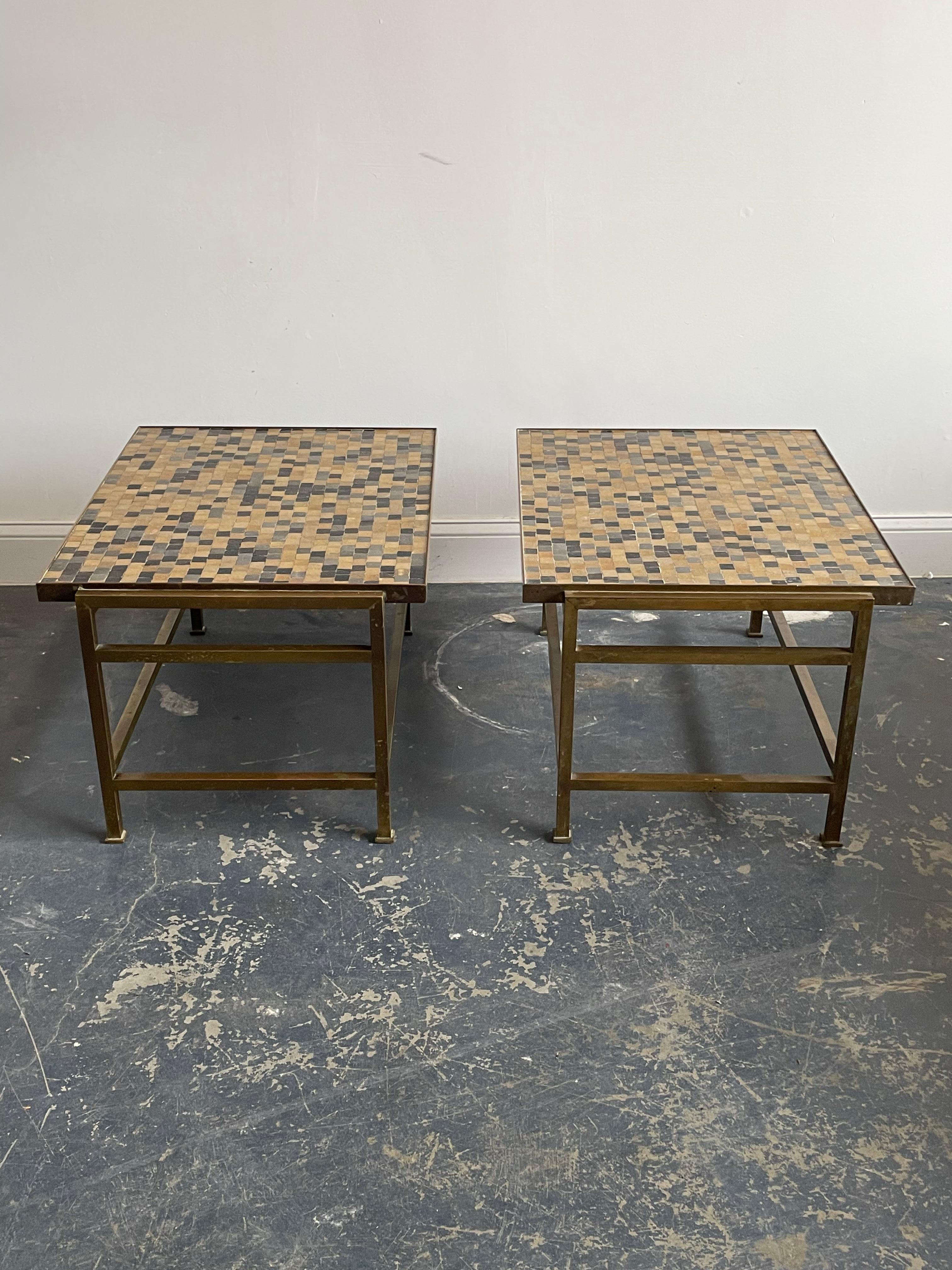 Rare pair of end tables designed by Edward Wormley for Dunbar. Featuring a mosaic murano glass tile top and brass framed base. Wonderful colors present throughout. In old original character with tasteful patina. 

Would work well with designers