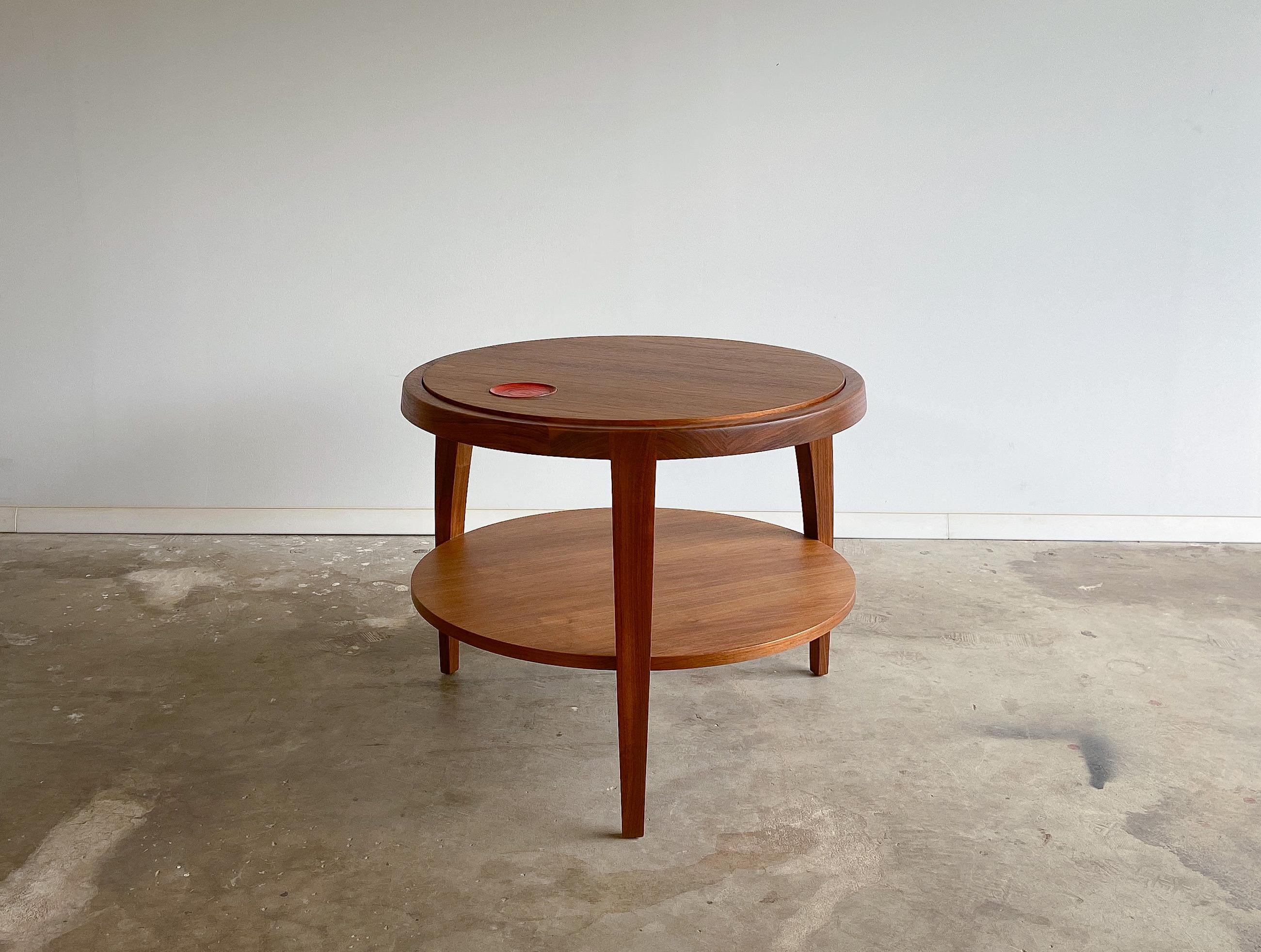 Offered is a rare occasional table designed by Edward Wormley for Dunbar. Model no. 319 is made from beautifully grained solid walnut, featuring a lovely inset ceramic tile by famed ceramicists Otto and Gertrud Natzler.

The Natzler tile