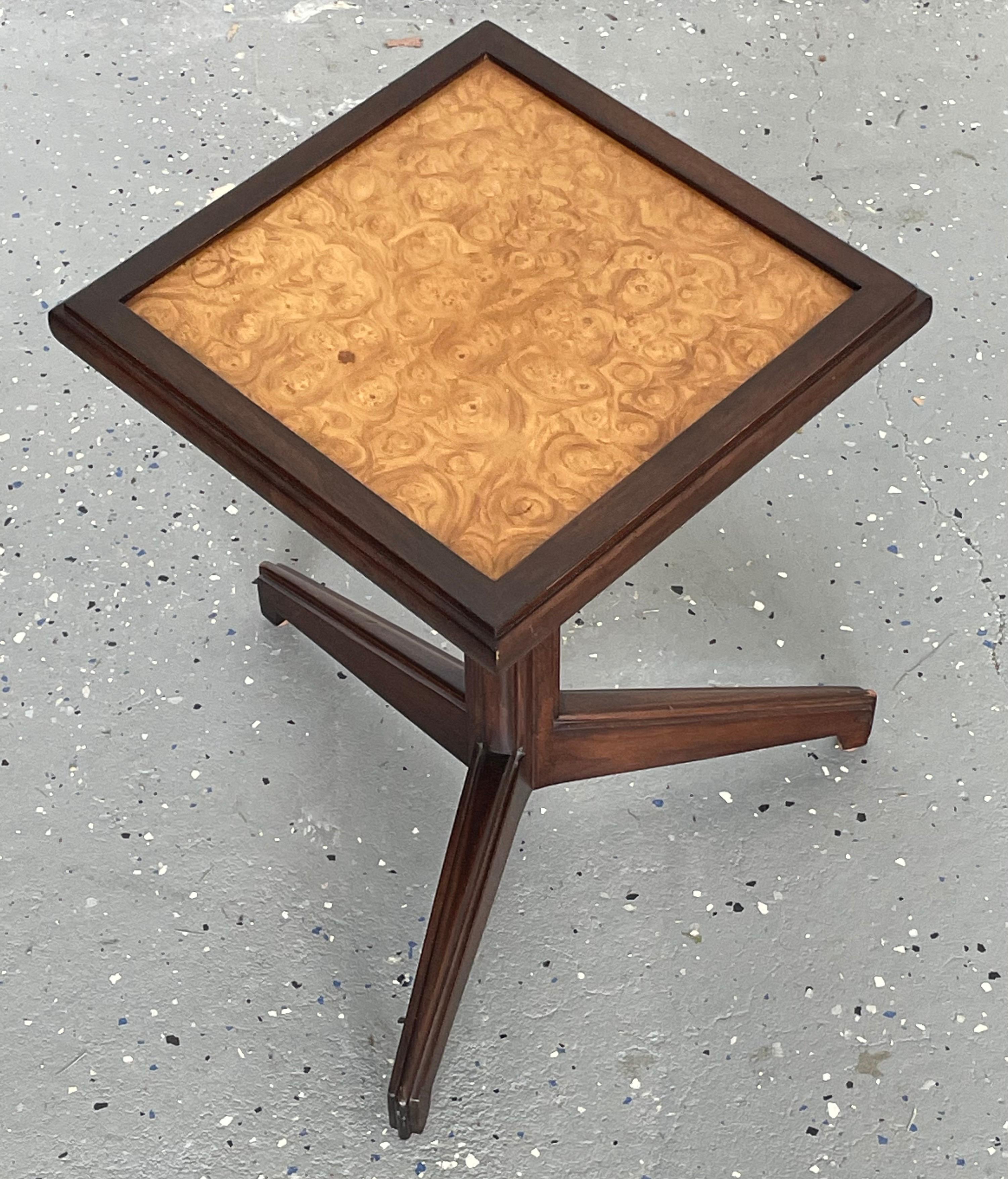 A rare drink table designed by Edward Wormley for a Dunbar’s “Janus” line, circa 1960s. Features a two-tone color palette with dark base and carpathian elm burl top.