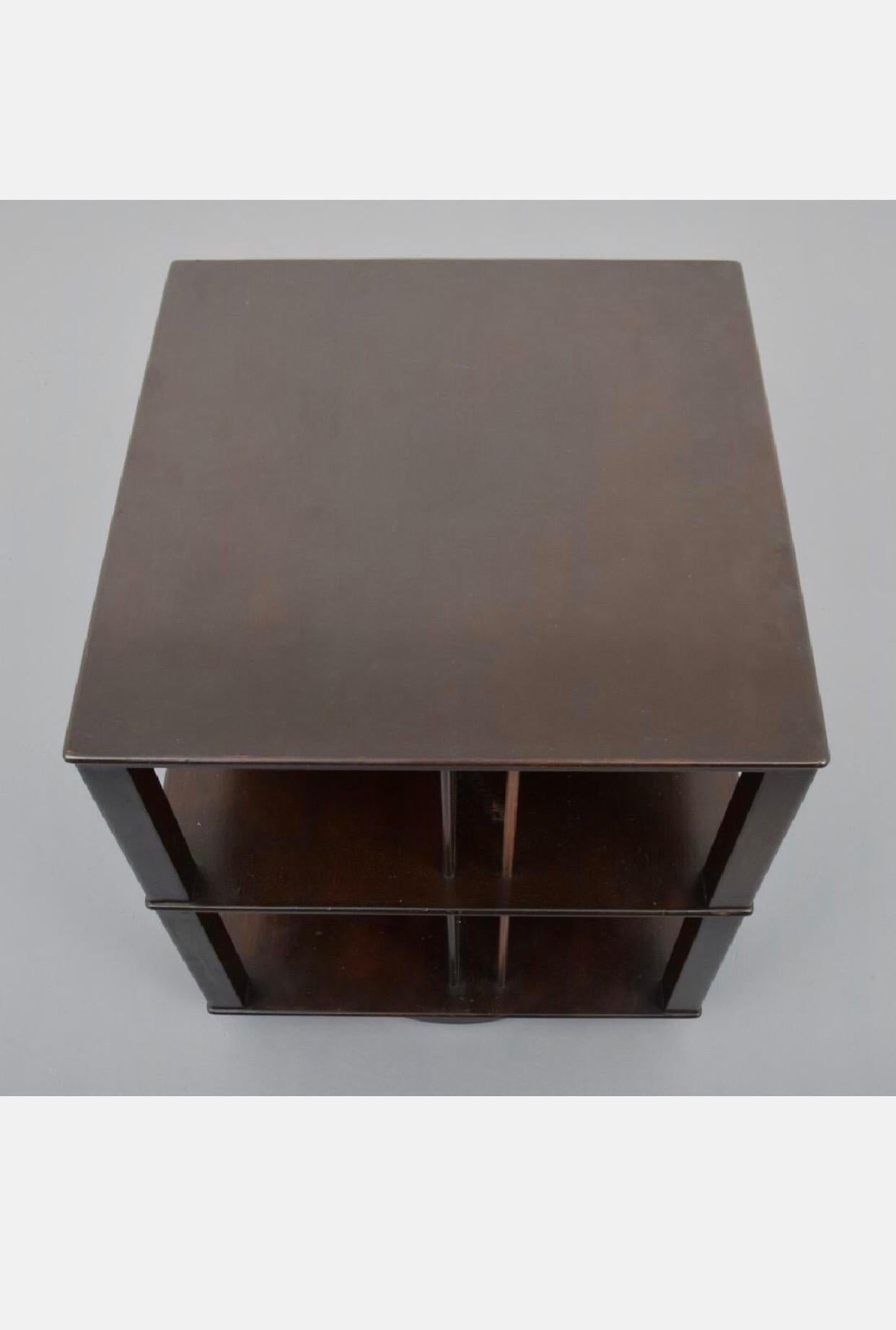 A gorgeous rotating bookcase by Edward Wormley for Dunbar. Model No. 5405

Dark ebonized finish has faint undertones which has worn beautifully.

Measures: 21.5” wide
21.5” deep
25.5” tall.