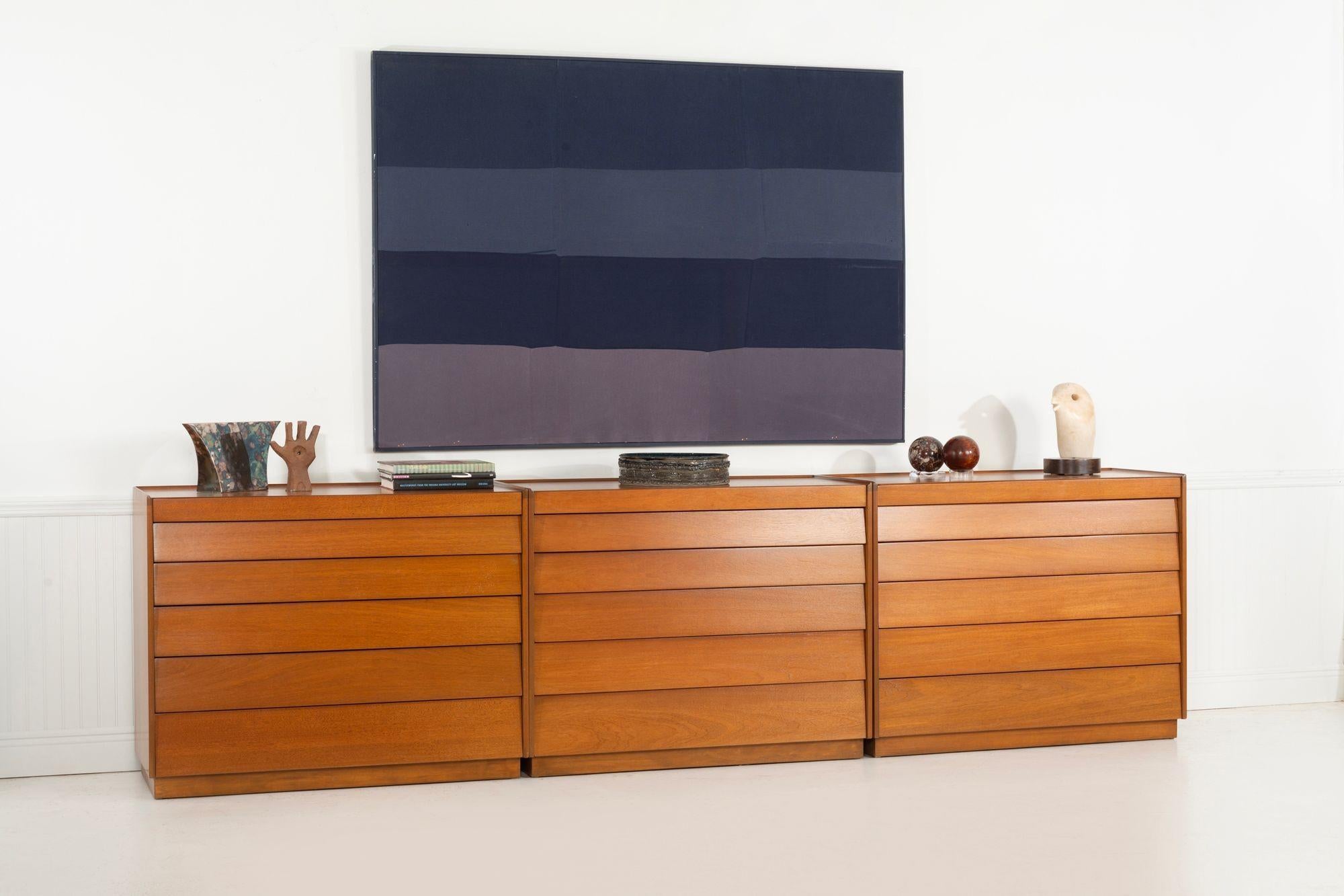 Edward Wormley for Dunbar, Set of Three Louvered Dressers in Mahogany
Set of three dressers in warm mahogany, each featuring six louvered drawers with recessed pulls and Wormley’s signature clean, architectural lines. A classic design combining