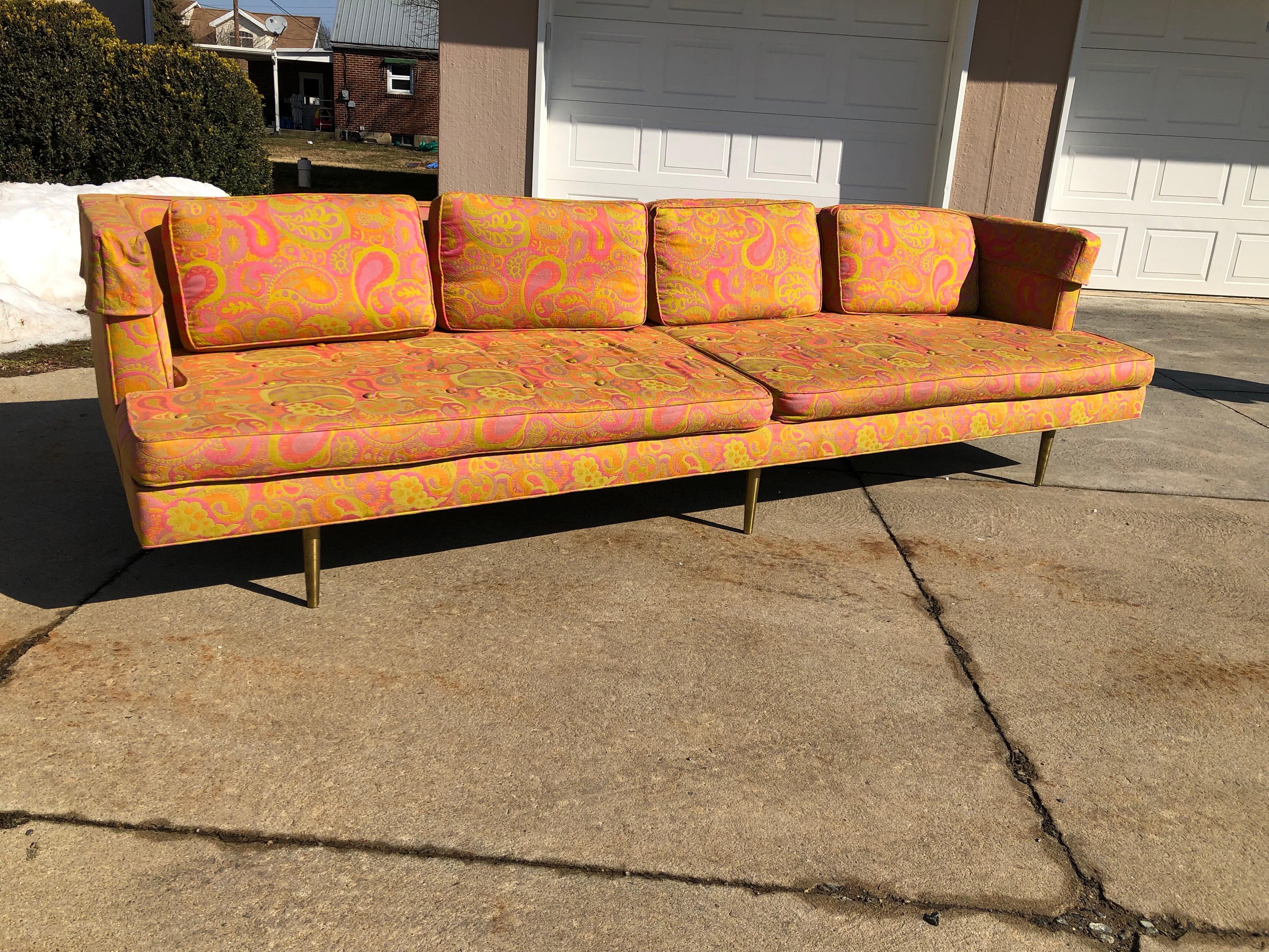 Edward Wormley for Dunbar sofa 4907 original Pop Art Pucci fabric great very little fade rare brass six legs.
A gorgeous, increasingly rare 9' long Edward Wormley for Dunbar sofa with rare brass legs. This sofa was model #4907 and two vintage