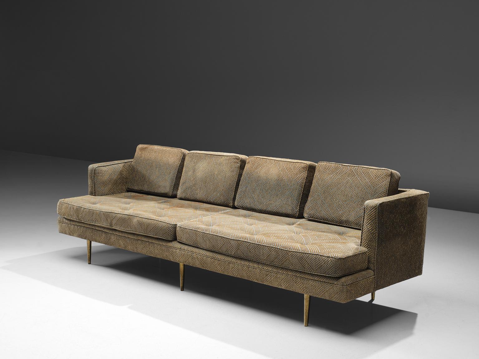 Edward Wormley for Dunbar, sofa 4907A, grey, champagne to beige colored velvet, brass, United States, 1950s. 

The style of the sofa is simple and elegant as it bears features of classic design combined with minimalist, sober influences. In the