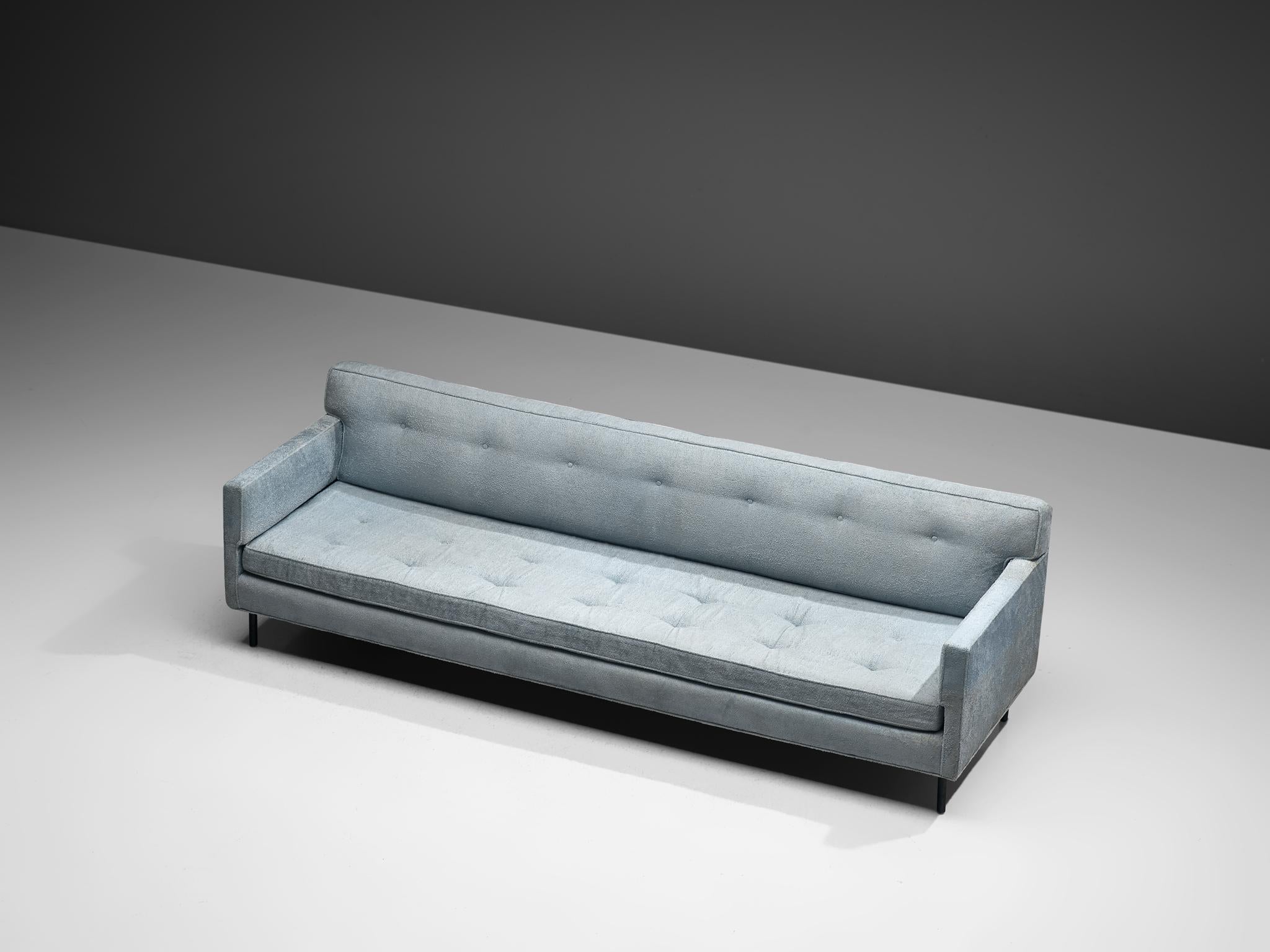 Edward Wormley for Dunbar, sofa, model 5150, fabric, metal, United States, 1950s. 

The sofa exudes a simple and elegant style, reminiscent of the classic design elements typically associated with Edward Wormley. The sofa features a light blue