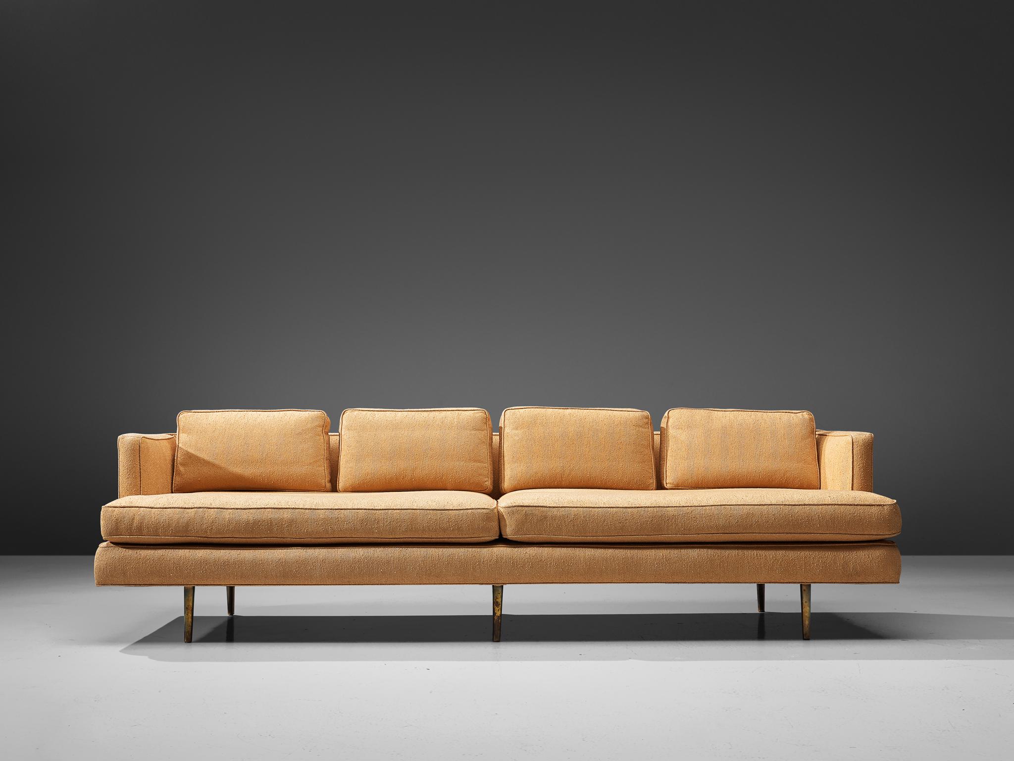 Edward Wormley for Dunbar, sofa model 4907, fabric and brass, United States, circa 1955.

A remarkable sofa by Edward Wormley that is purely elegant, as it bears features of classic design combined with Minimalist, sober influences. In the words