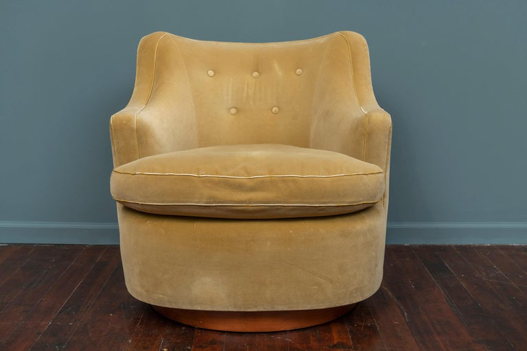 Edward Wormley design for Dunbar swivel lounge chairs on walnut bases. Restored a few years ago but still present well with beautiful light citrus velvet and down filled seat cushions that show light wear and tear. Newly replaced swivel mechanisms