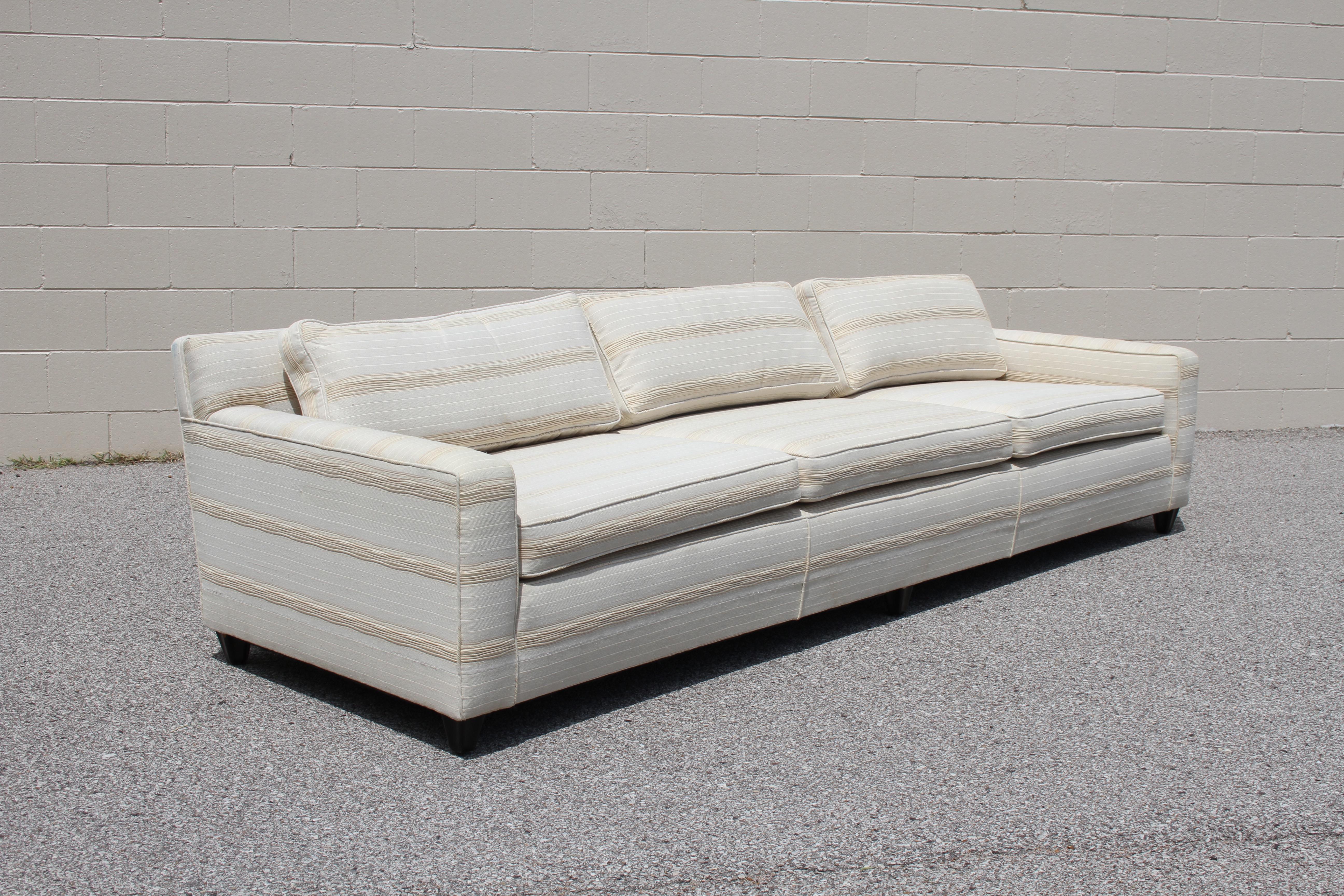 Edward Wormley for Dunbar 9' Tuxedo sofa, elegant yet modern, circa 1950s. Hard to beat the quality and craftsmanship of a Dunbar sofa. Fresh from a one owner estate, where most of the furniture was Dunbar. Reupholstered at some point, needs to be