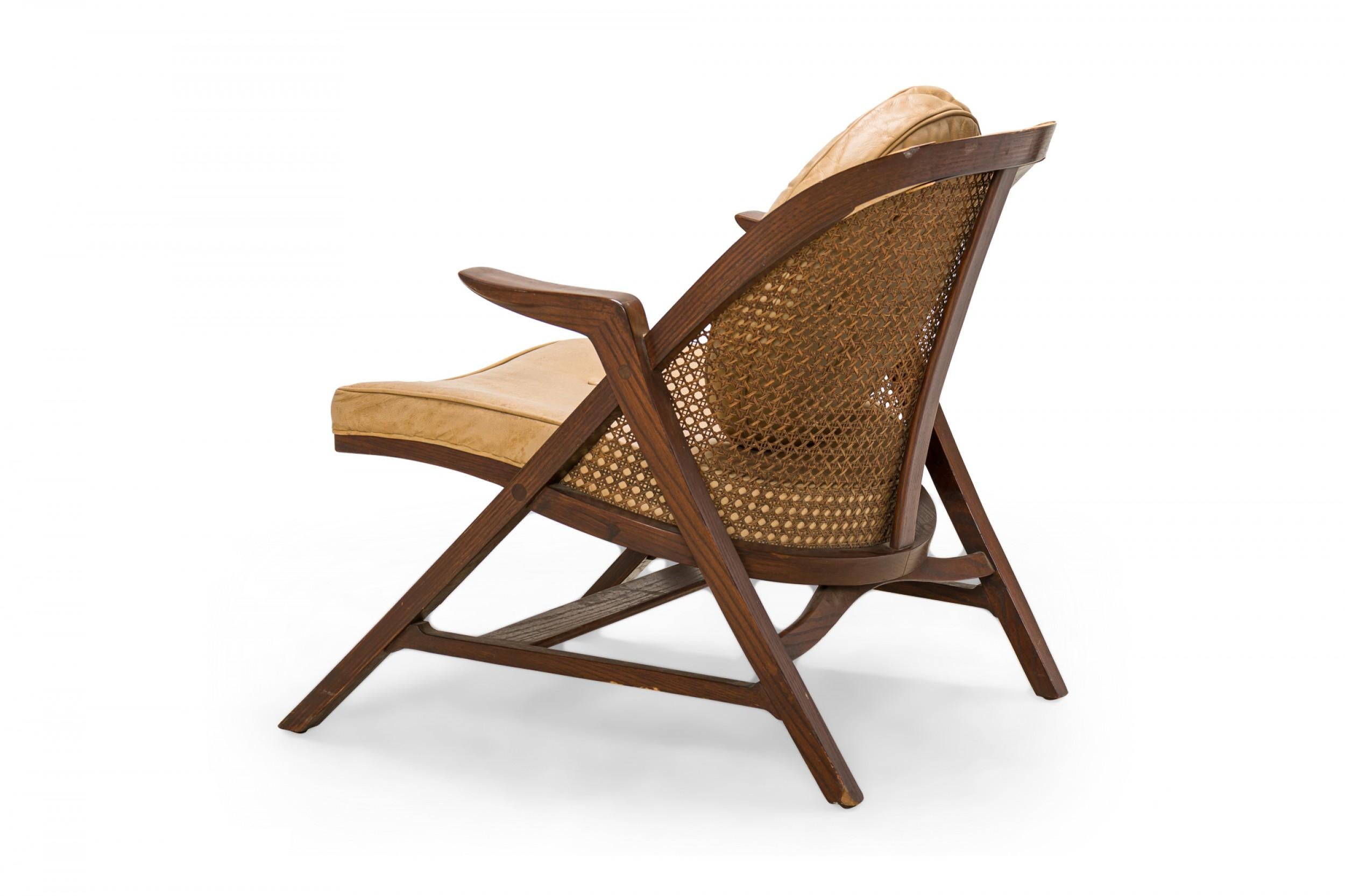 American Edward Wormley for Dunbar Walnut, Cane, and Tan Leather 'Janus' Lounge Armchair For Sale