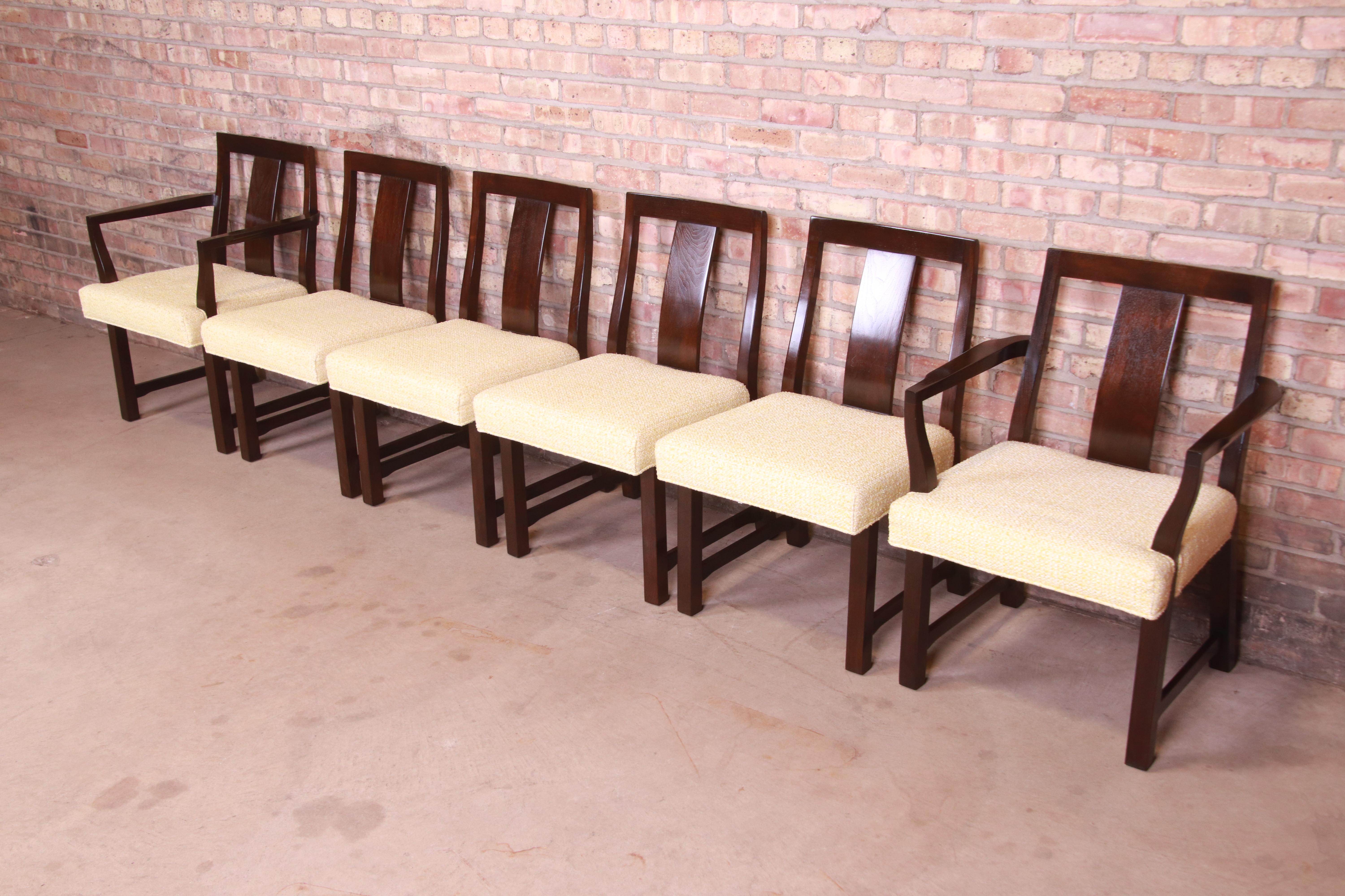 An exceptional set of six mid-century modern dining chairs

By Edward Wormley for Dunbar Furniture,

USA, 1950s

Solid walnut frames, with original light yellow tweed upholstery.

Measures:
Side chairs - 20.75