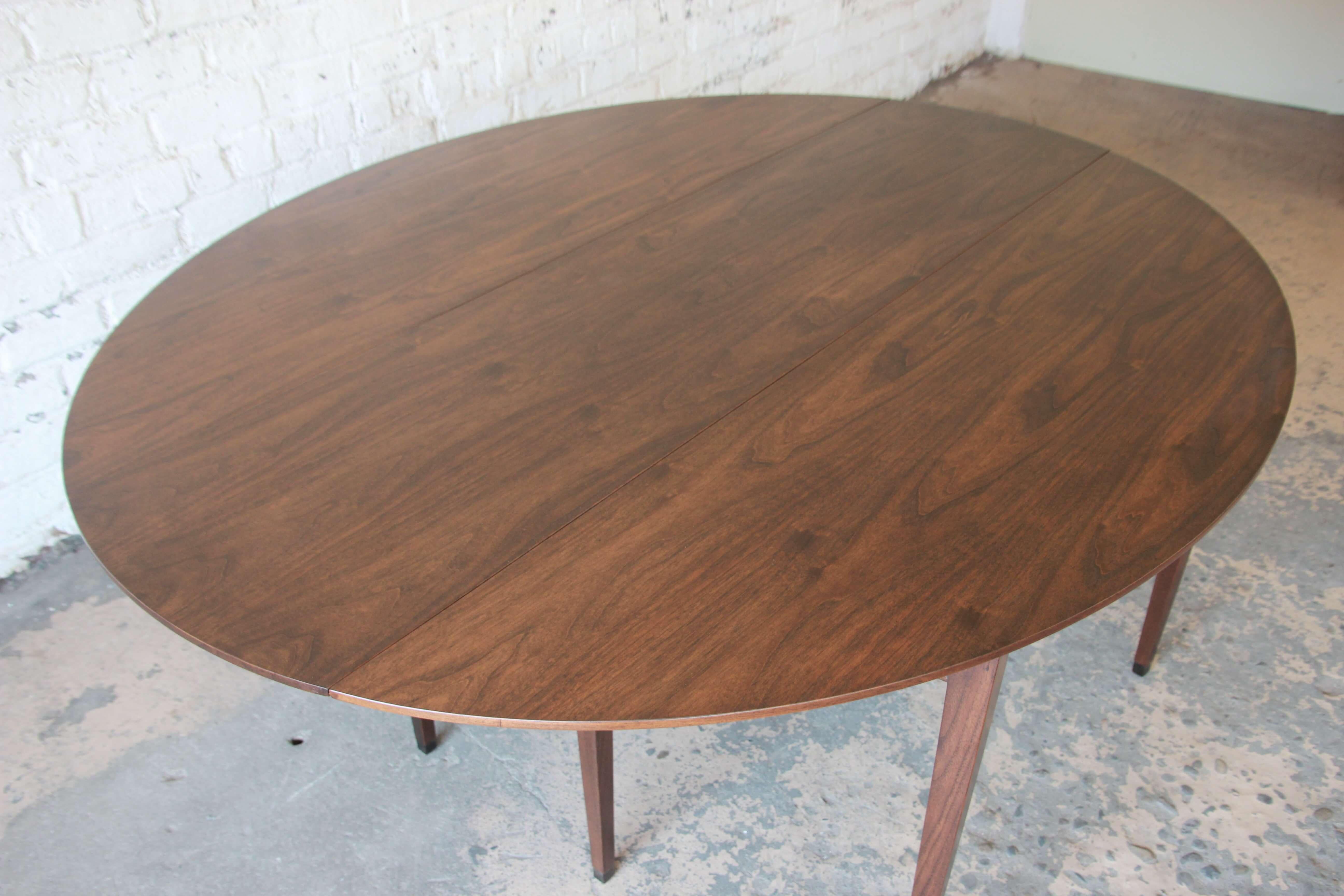 Edward Wormley for Dunbar Walnut Oval Drop-Leaf Dining Table In Good Condition In South Bend, IN