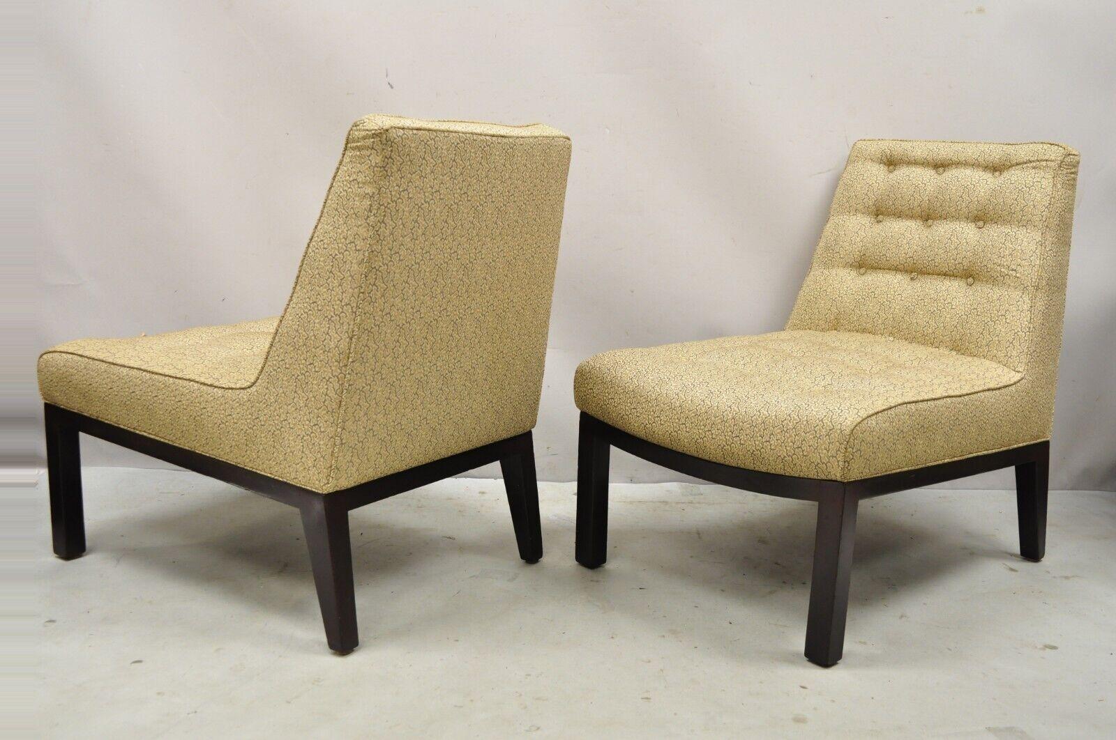 Edward Wormley for Dunbar wood frame slipper lounge chairs - a pair. Item features nice deep frames, solid wood base, tapered and angled backs. Original label, very nice vintage pair, clean modernist lines, great style and form. circa Mid-20th
