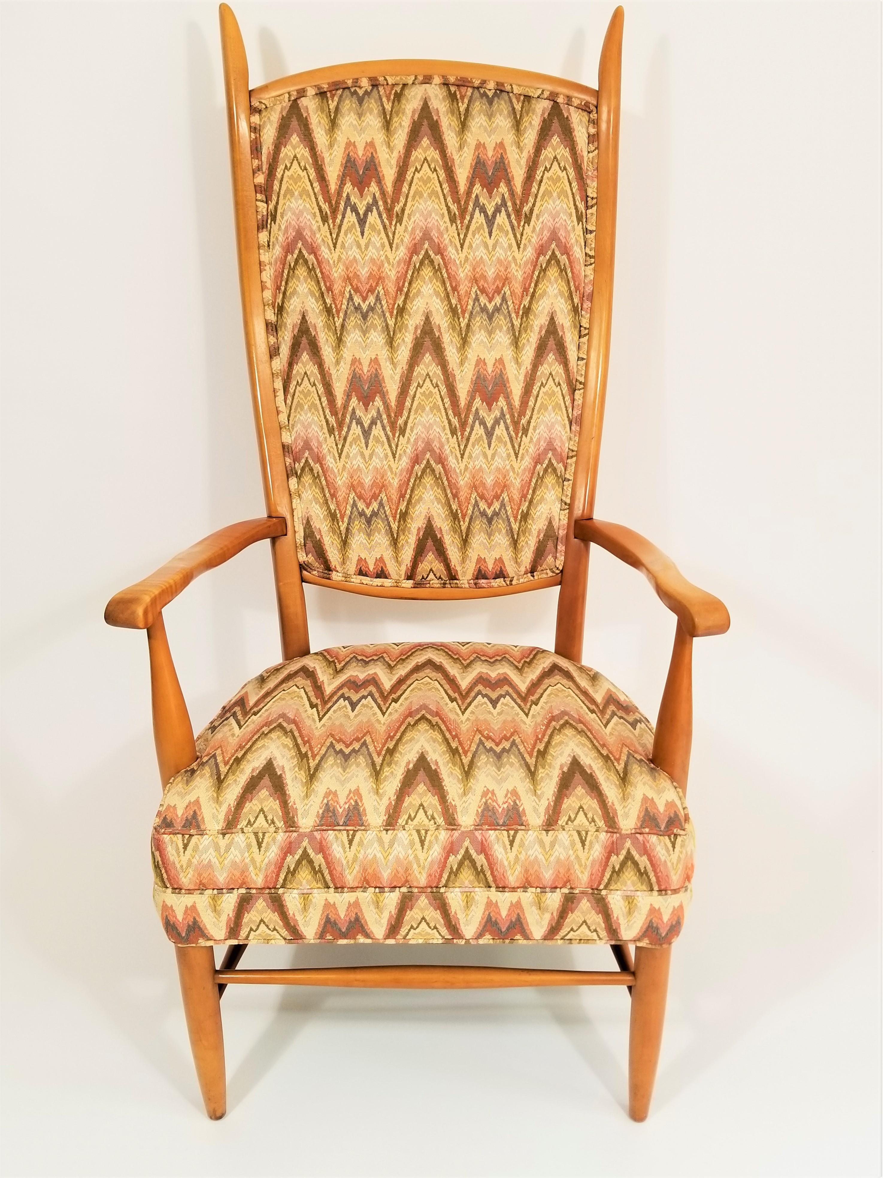 Beautiful midcentury late 1950s-early 1960s Pronounced high back statement chair. Maple wood frame. Excellent quality fabric / upholstery. Italian influence design of the era. Very Good Condition. 
Complimentary local delivery in NYC and surrounding