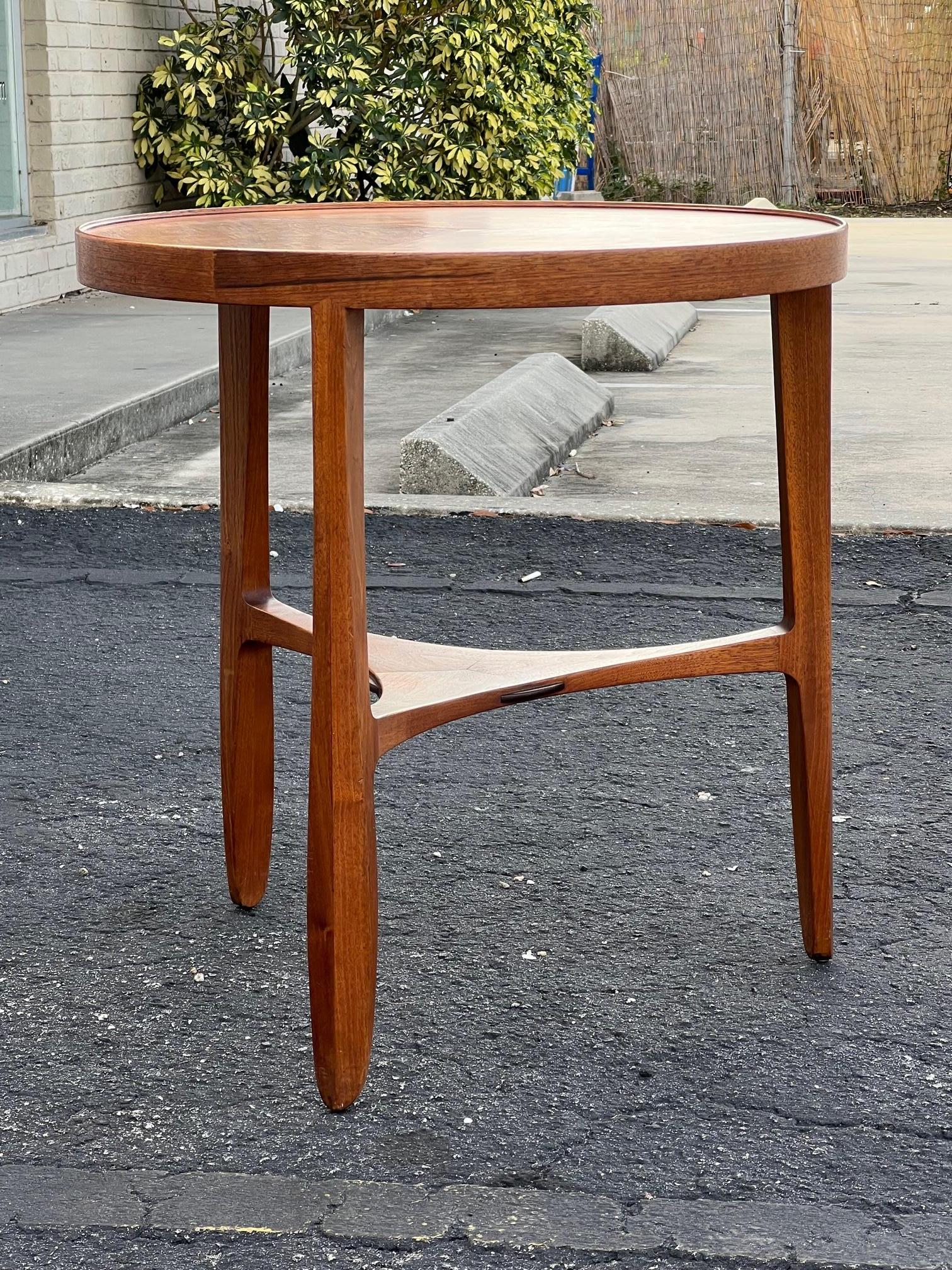 A rare Edward Wormley side or lamp table made by Dunbar ca’1950’s. Sculptural and elegant design that remains timeless. 