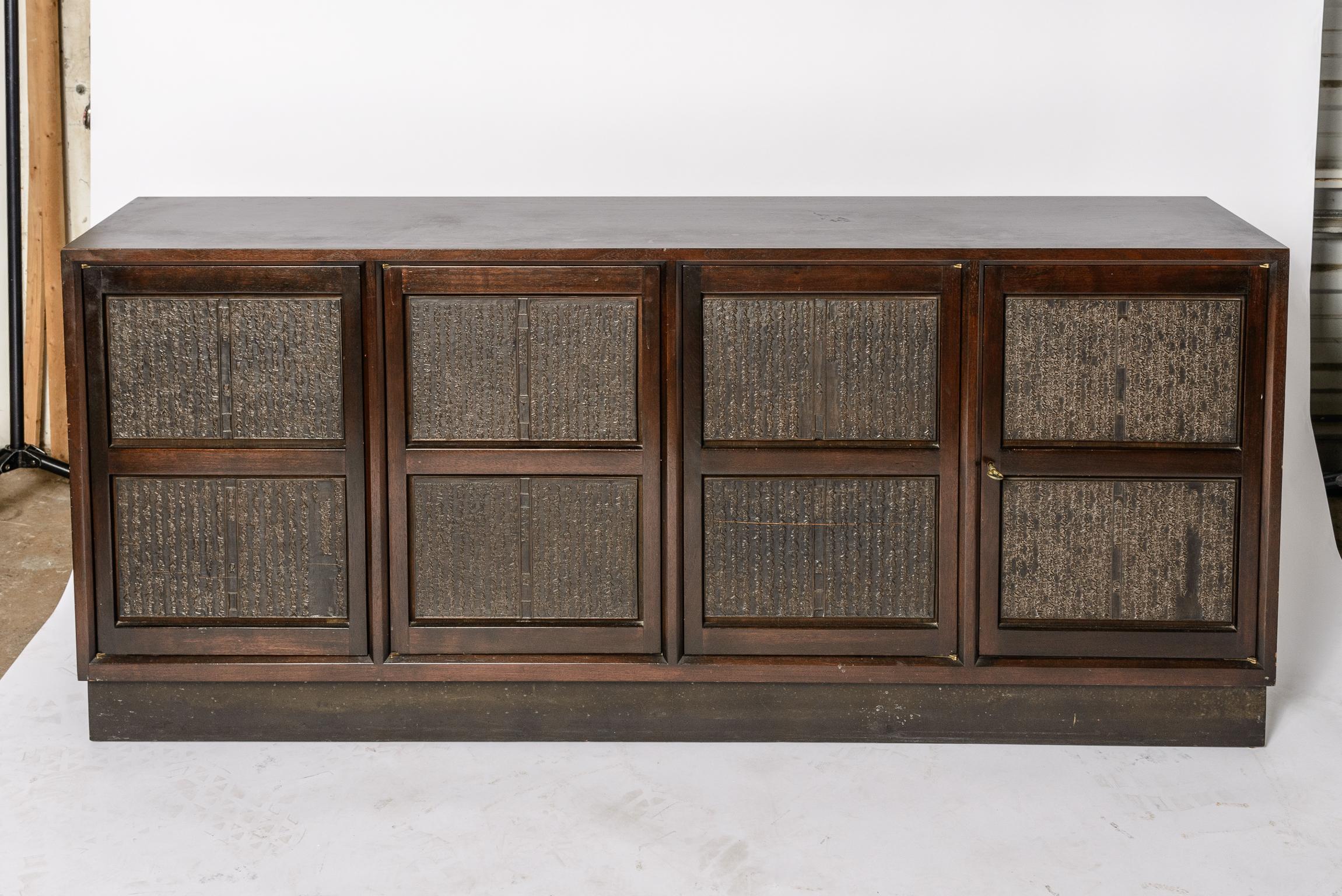 A wonderful example from Mr. Wormley's most prolific period.
A walnut case surrounds 4 doors highlighted with Antique Japanese Printers Blocks.
Hand carved in Rosewood.
Manufacturer's label on rear of cabinet.
Copy of original invoice available.
