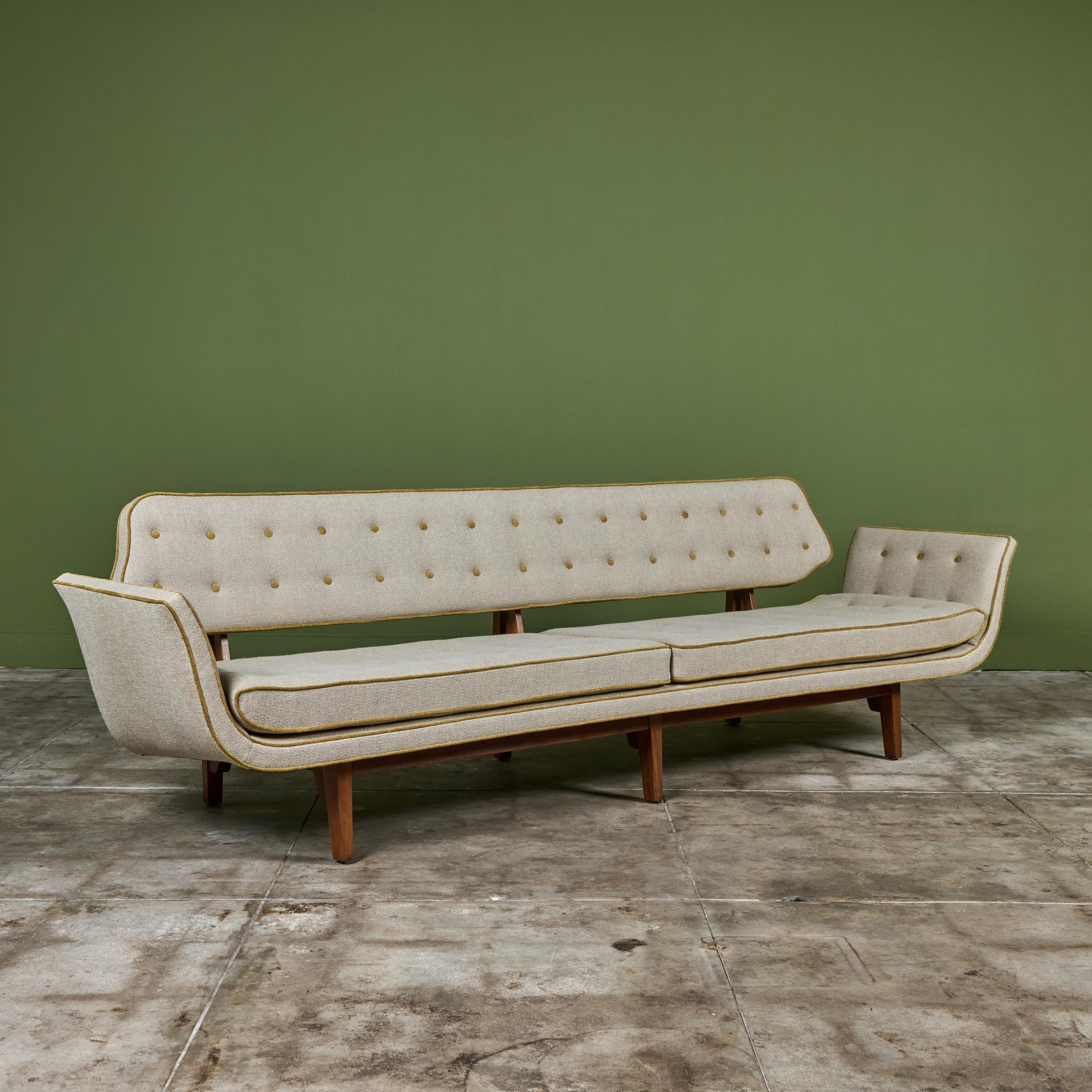 Edward Wormley for Dunbar, c.1950s, USA, La Gondola sofa. The extra long sofa features a mahogany frame that supports the backrest and seat offering a floating effect to the seat back. Though a seemingly simple design this sofa is recognized as one