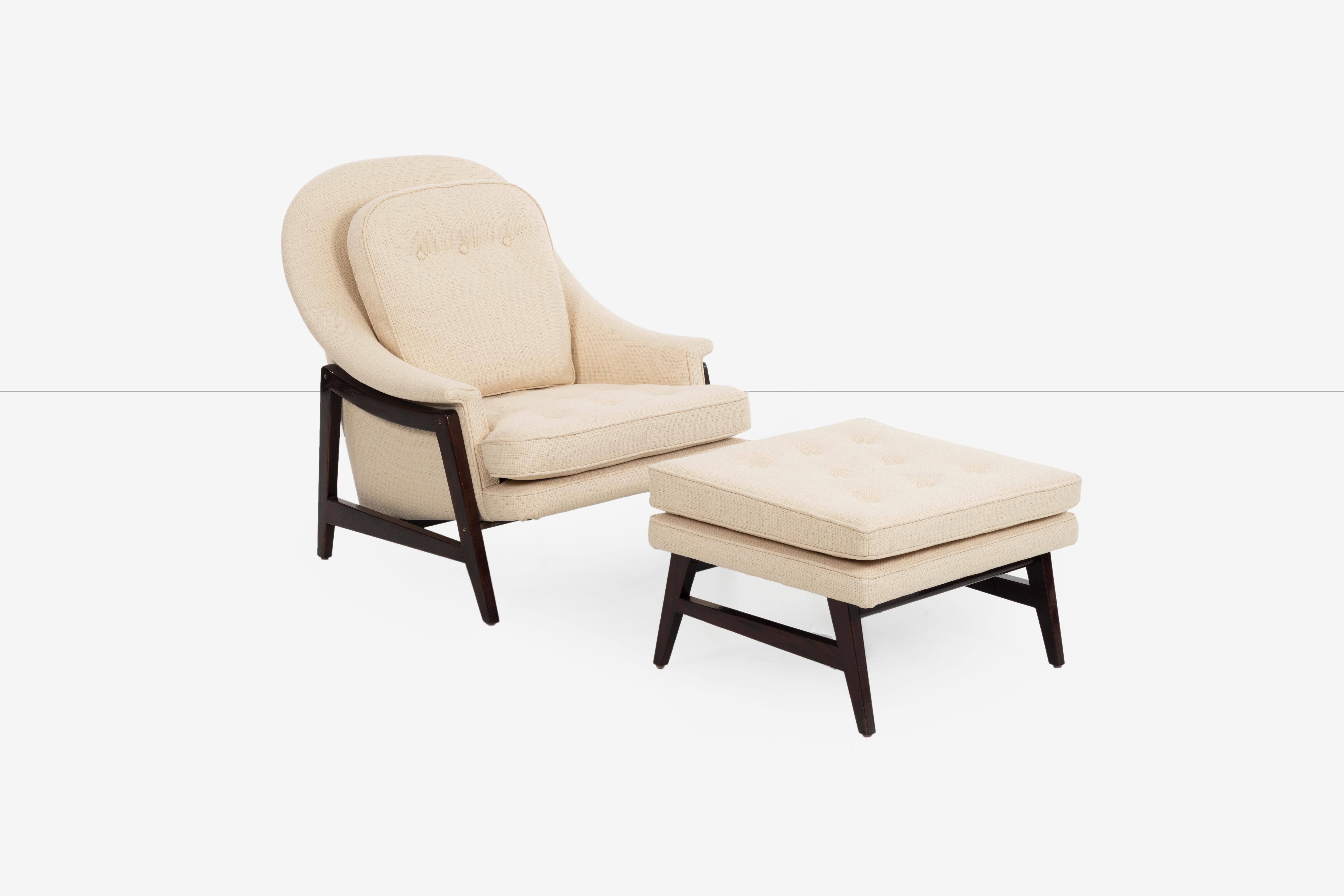 Edward Wormley for Dunbar, Janus collection lounge chair and ottoman, model 5701 Reupholstered in Holly Hunt, Great Plains cotton-poly weave with combed open grained ashwood frame and brass stretchers. 
[Dunbar signed under seat