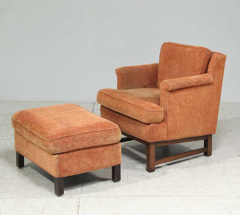 A Dunbar lounge chair with matching ottoman, designed by Edward Wormley.

Dimensions of the ottoman are:
Height 40 cm, width 70 cm, depth 54 cm.