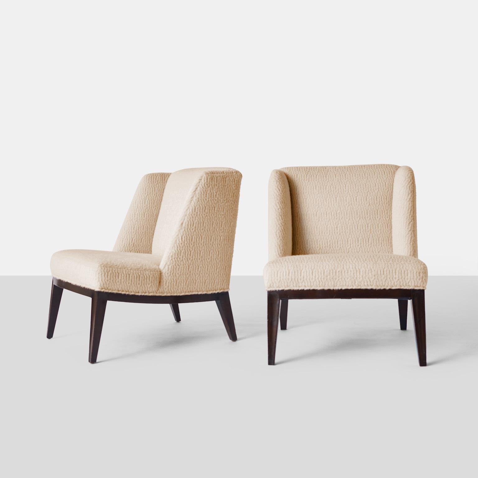 Edward Wormley Slipper Lounge Chairs
A pair of slipper style lounge chairs with lacquered mahogany frames and restored in luxuriously soft Sandra Jordan Prima Alpaca.
Each chair retains the original metal Dunbar tags.
USA, circa 1967.