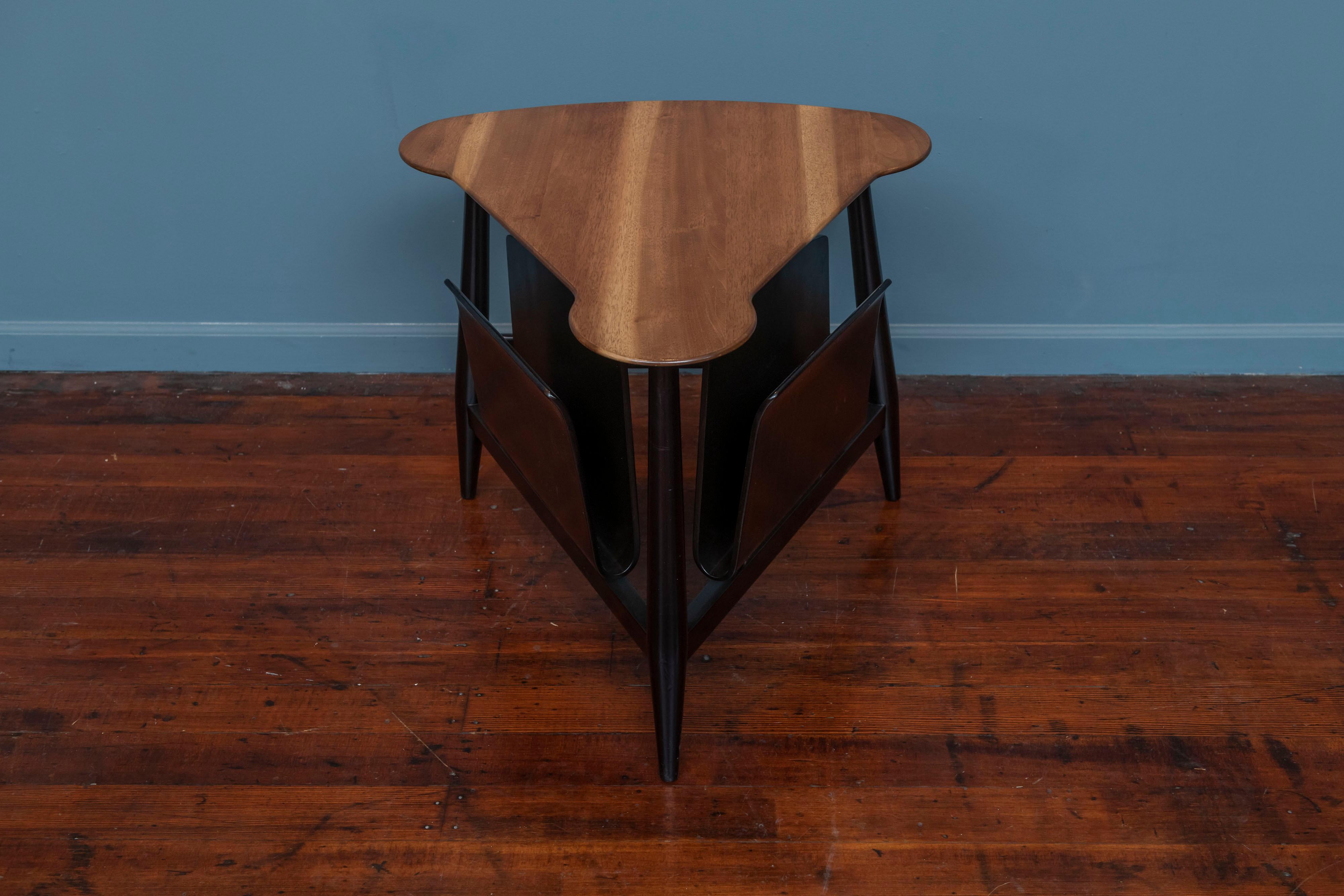 Edward Wormley magazine table for Dunbar, Berne Indiana. Classic mid-century design by Edward Wormley, sophisticated yet modern. Newly refinished with original order tags intact, ready to enjoy.