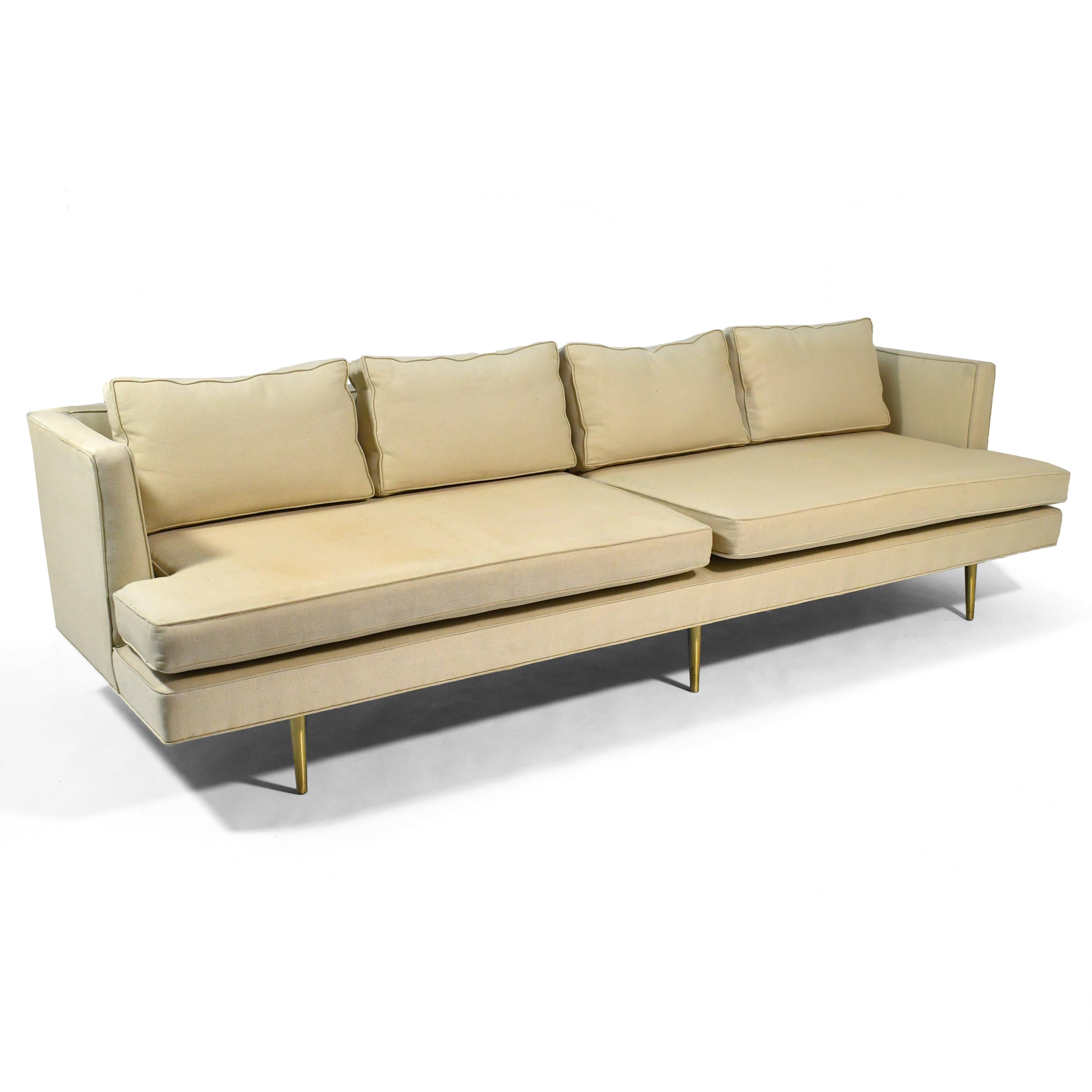 n our opinion, this Ed Wormely design for Dunbar is one of the most spectacular sofas ever made. Modern, classic, and timeless... this form transcends styles, genres and eras. Nine feet of upholstered seating with loose cushions and 3/4 arms sits