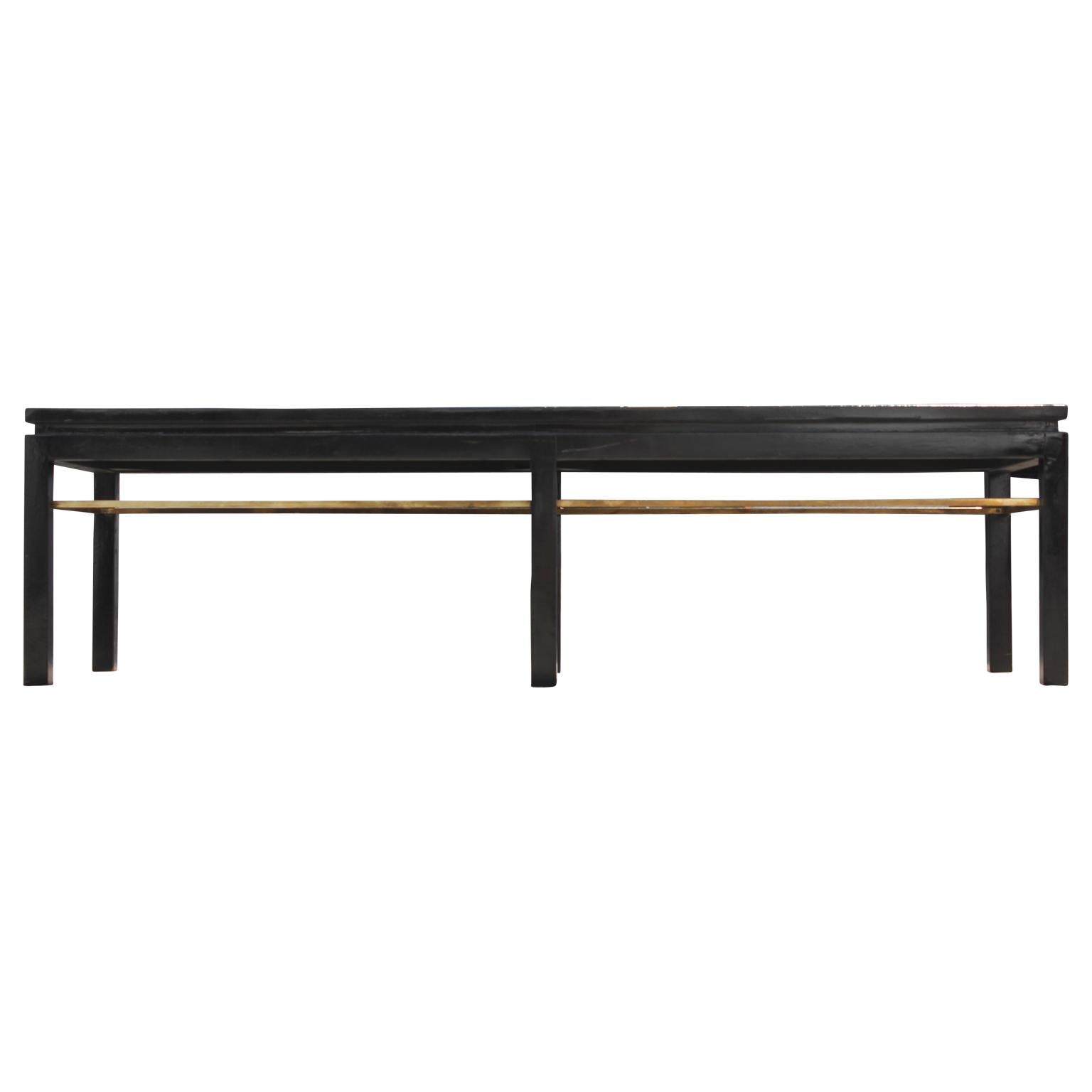 Edward Wormley for Dunbar coffee table with brass accents. It is currently finished in a high gloss which can be toned down if desired.
 