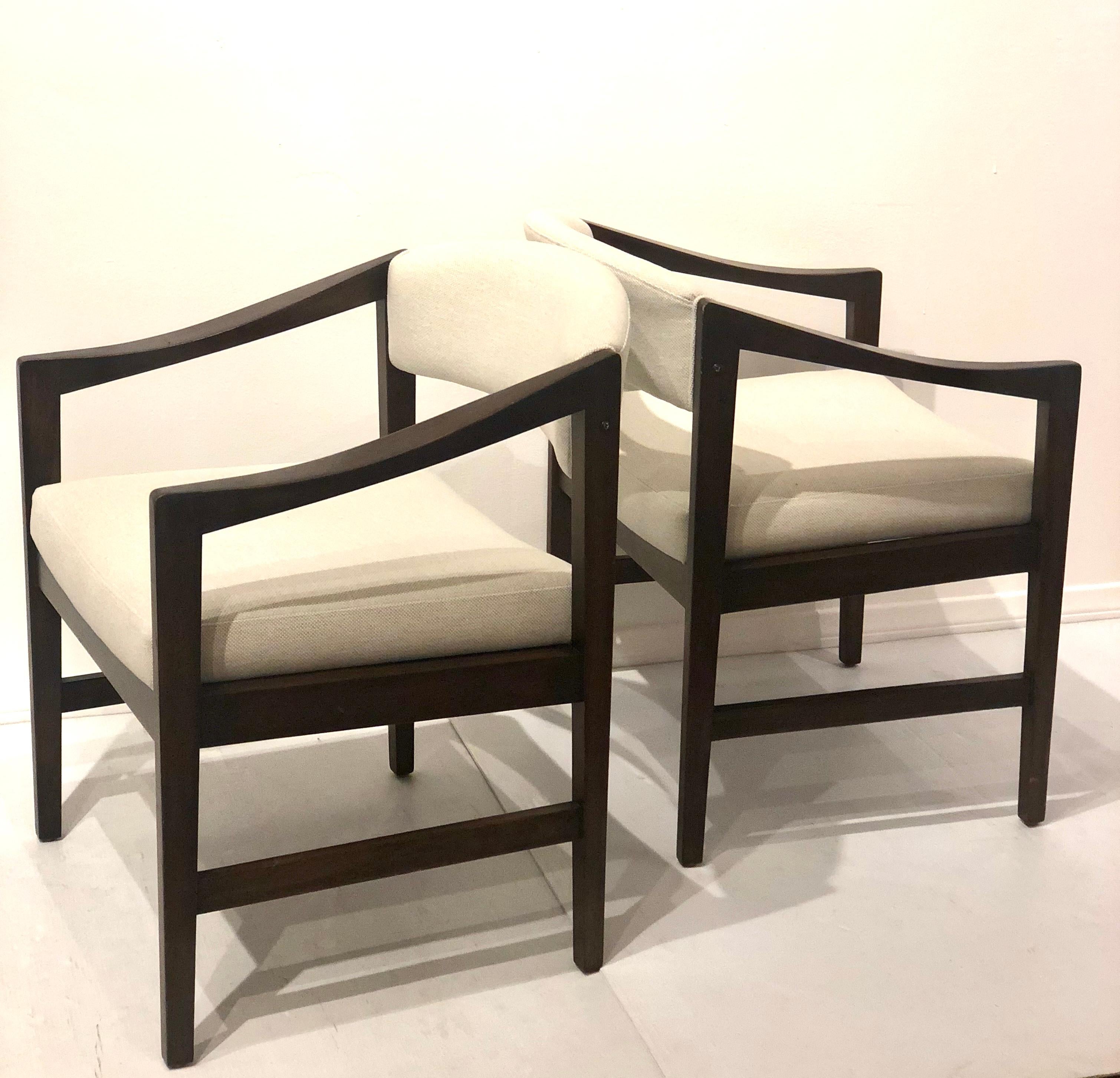 Open frame lounge chairs by Edward Wormley for Dunbar. Mahogany frames with rosewood finish and cream color new upholstery, nice condition solid and sturdy.