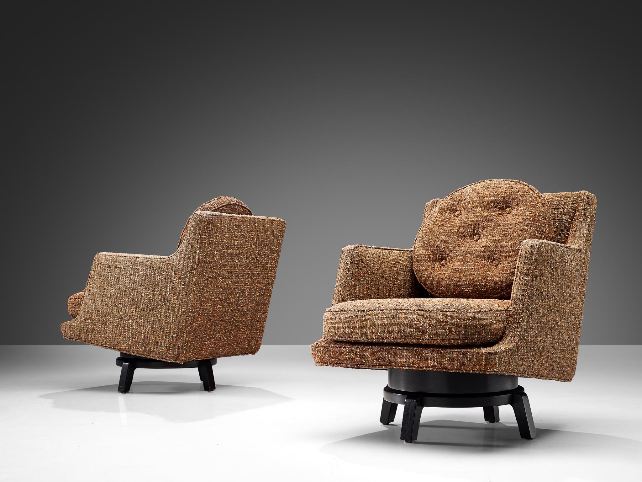 Edward Wormley, swivel lounge chairs, model 5609, fabric, mahogany, United States, 1950s

These swivelling lounge chairs by Edward Wormley feature are a combination of a traditional design with great geometric forms but also playful detailing. A