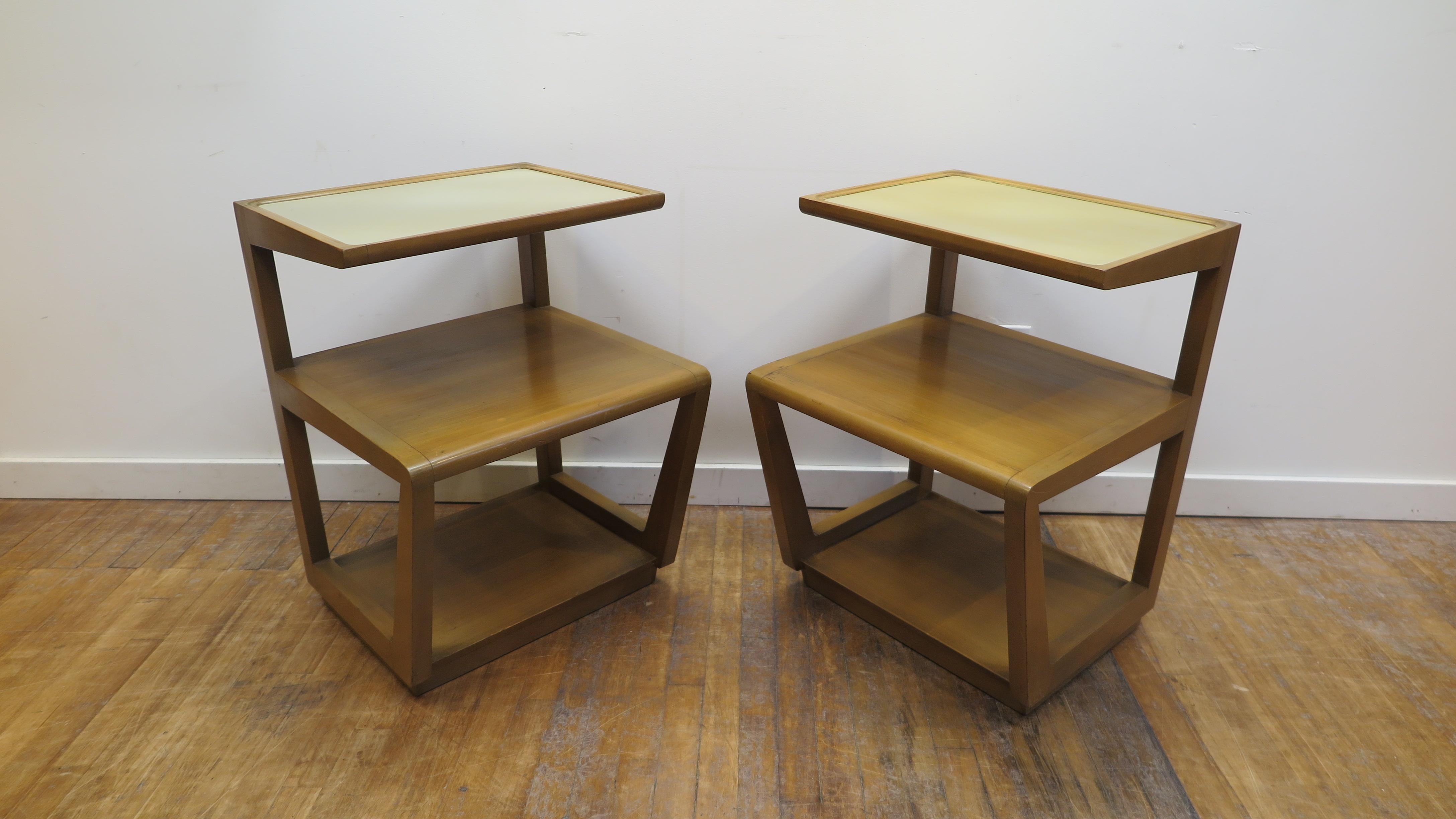 Pair of Edward Wormley tiered end tables precedent line for Drexel. An early pair of Edward Wormley modernism designed end tables. Architecturally brilliant and stunning these tables are sought after by collectors. Their amazing lines with the