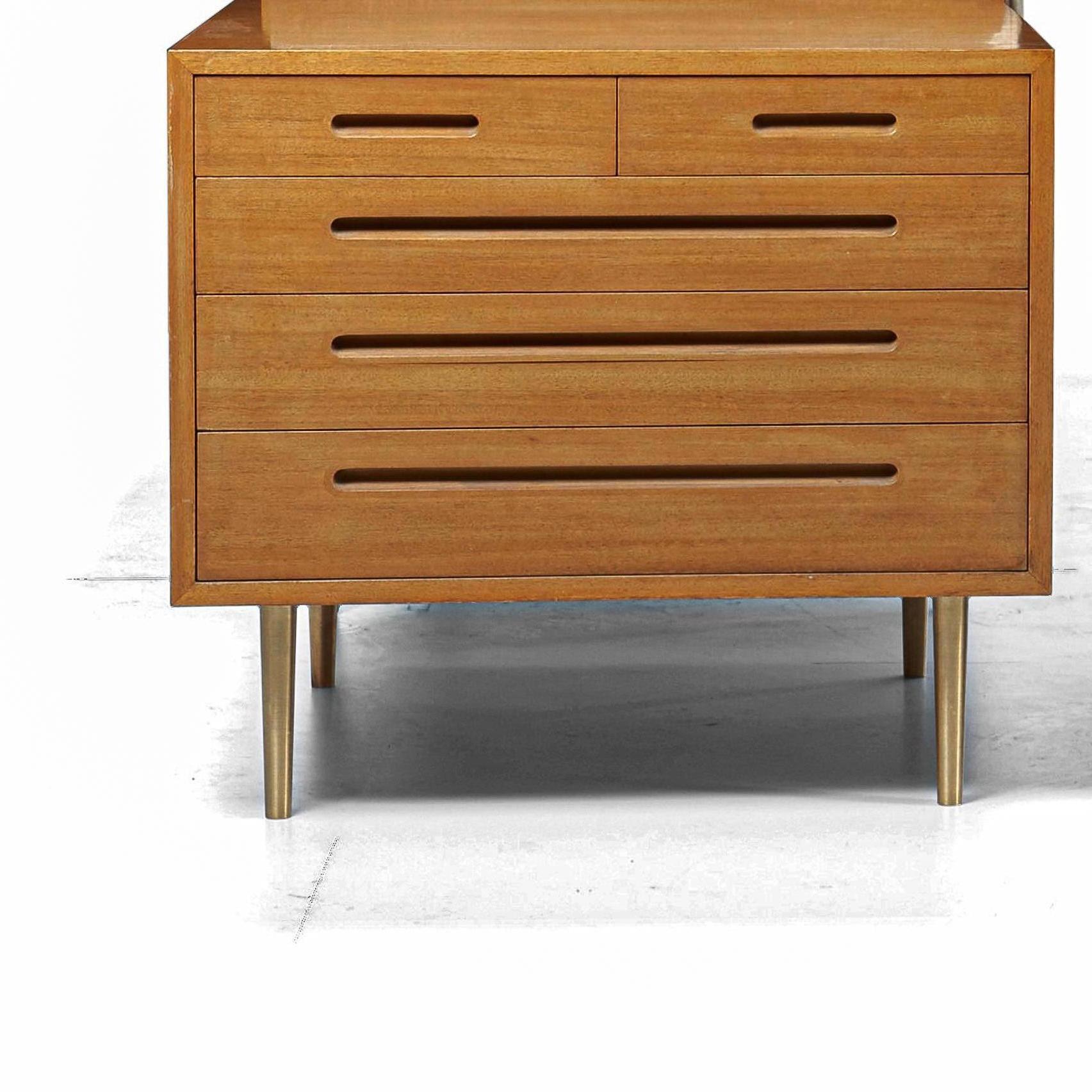 Edward Wormley for Dunbar 5-drawer cabinet, mahogany wood with tapered brass legs.
[metal tag Dunbar].