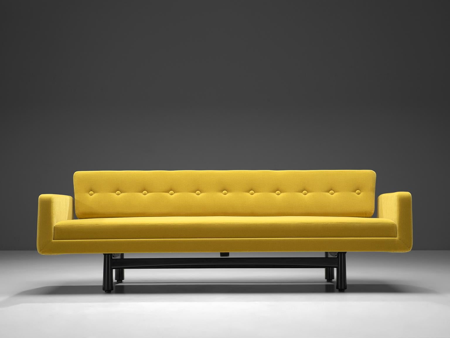 Edward Wormley, sofa Model 5316, yellow fabric, black mahogany frame, United States, circa 1950s. 

This three-seat sofa is designed circa 1965. The luxurious, high quality yellow fabric turns this, rather clean and elegant sofa into a real
