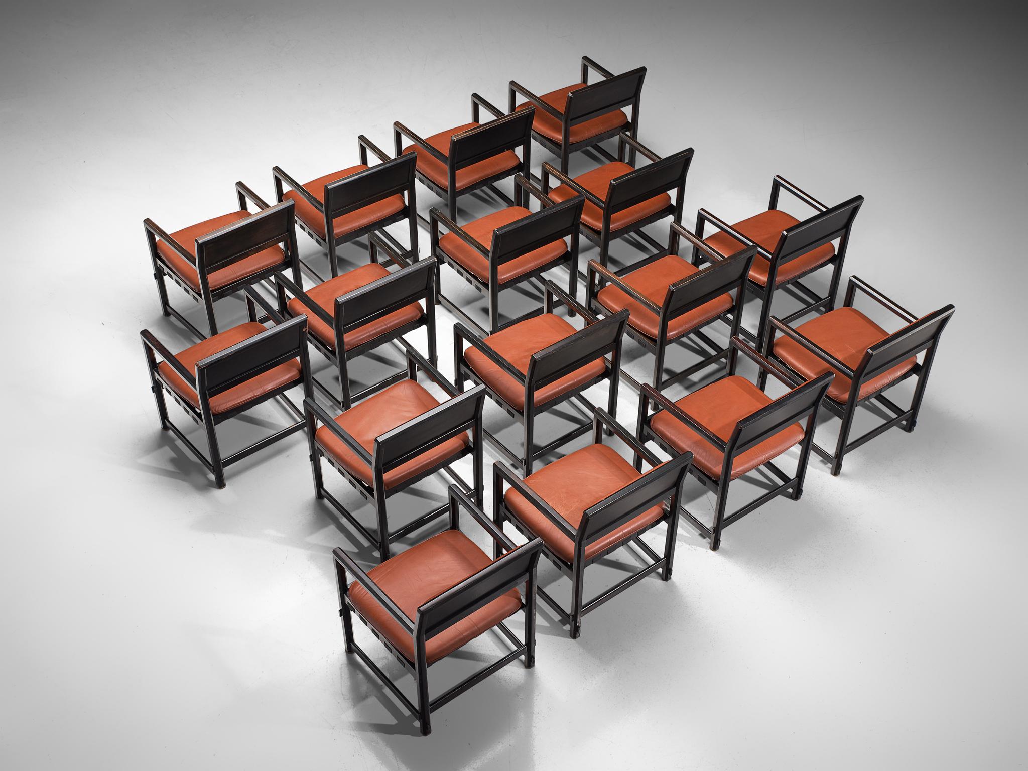Edward Wormley for Dunbar by Mobilier Universel, set of 16 armchairs model 5762, lacquered black wood, red leather, Belgium, design 1957

This set of 16 grand armchairs by Edward Wormley designed in 1957 consists of a black lacquered frame and a red